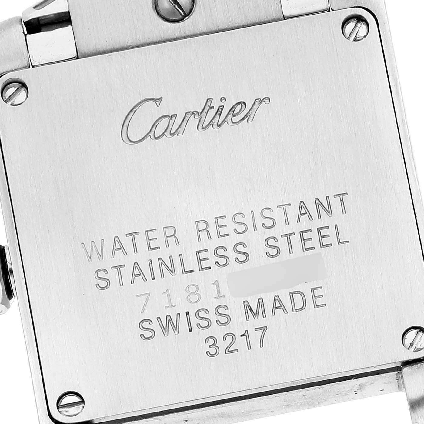 This image shows the back case of a Cartier Tank Française watch, displaying its branding and specifications.