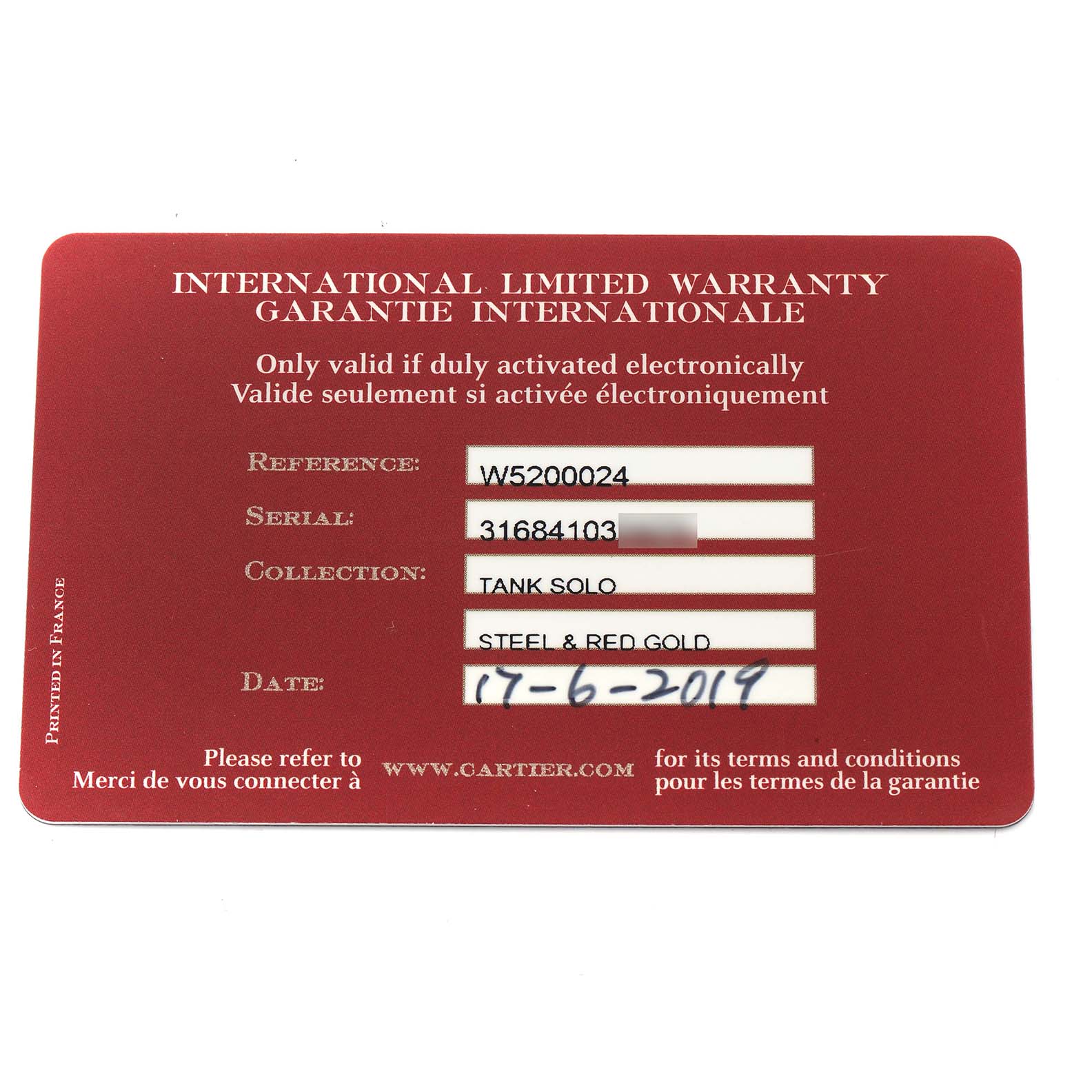 The image shows a Cartier Tank Solo W5200002 Women
s Steel and Gold (two tone) Silver Dial warranty card with details such as reference, serial number, and date.