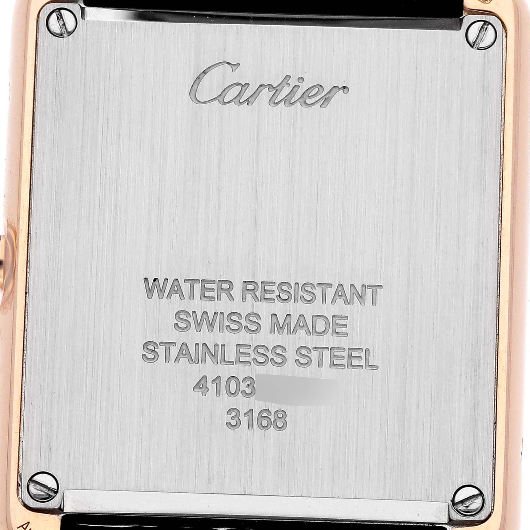 The image shows the back of a Cartier Tank Solo W5200024 Women
s Steel and Gold (two tone) Silver Dial watch, highlighting the stainless steel case and engraved details.