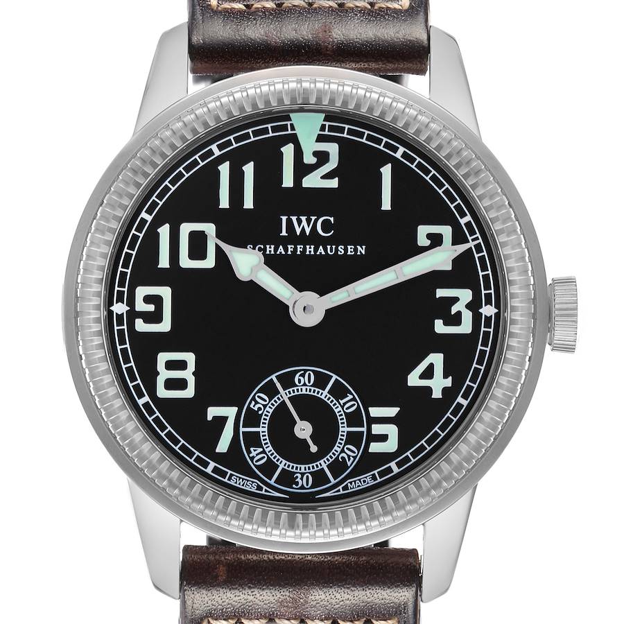 The IWC Pilot model IW325401 watch is shown from the front, highlighting its dial, numerals, hands, and case, along with part of the leather strap.