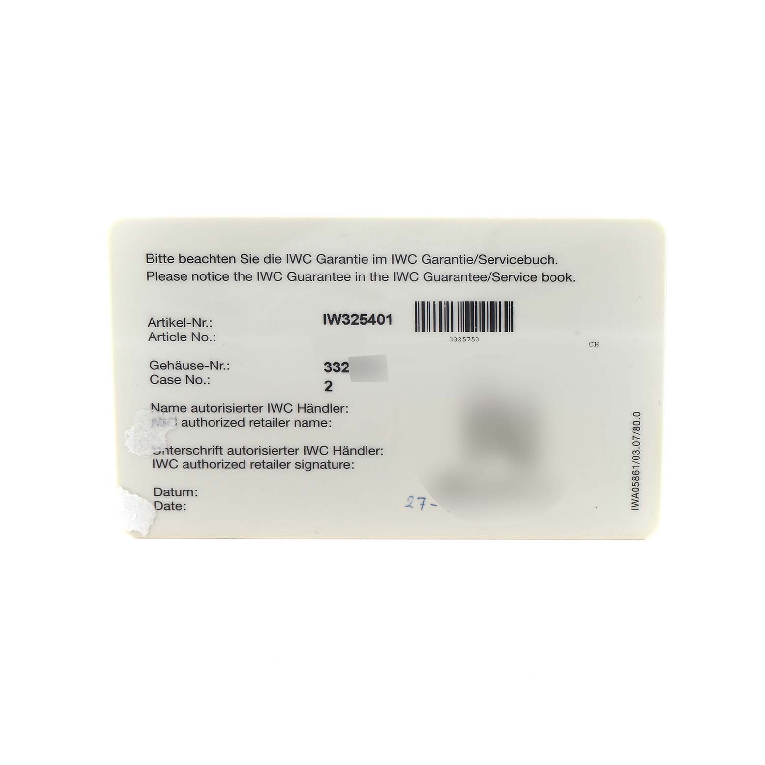 The image shows a warranty card for an IWC Pilot IW325401 Men
s Platinum Black Dial model watch, displaying the article and case numbers.