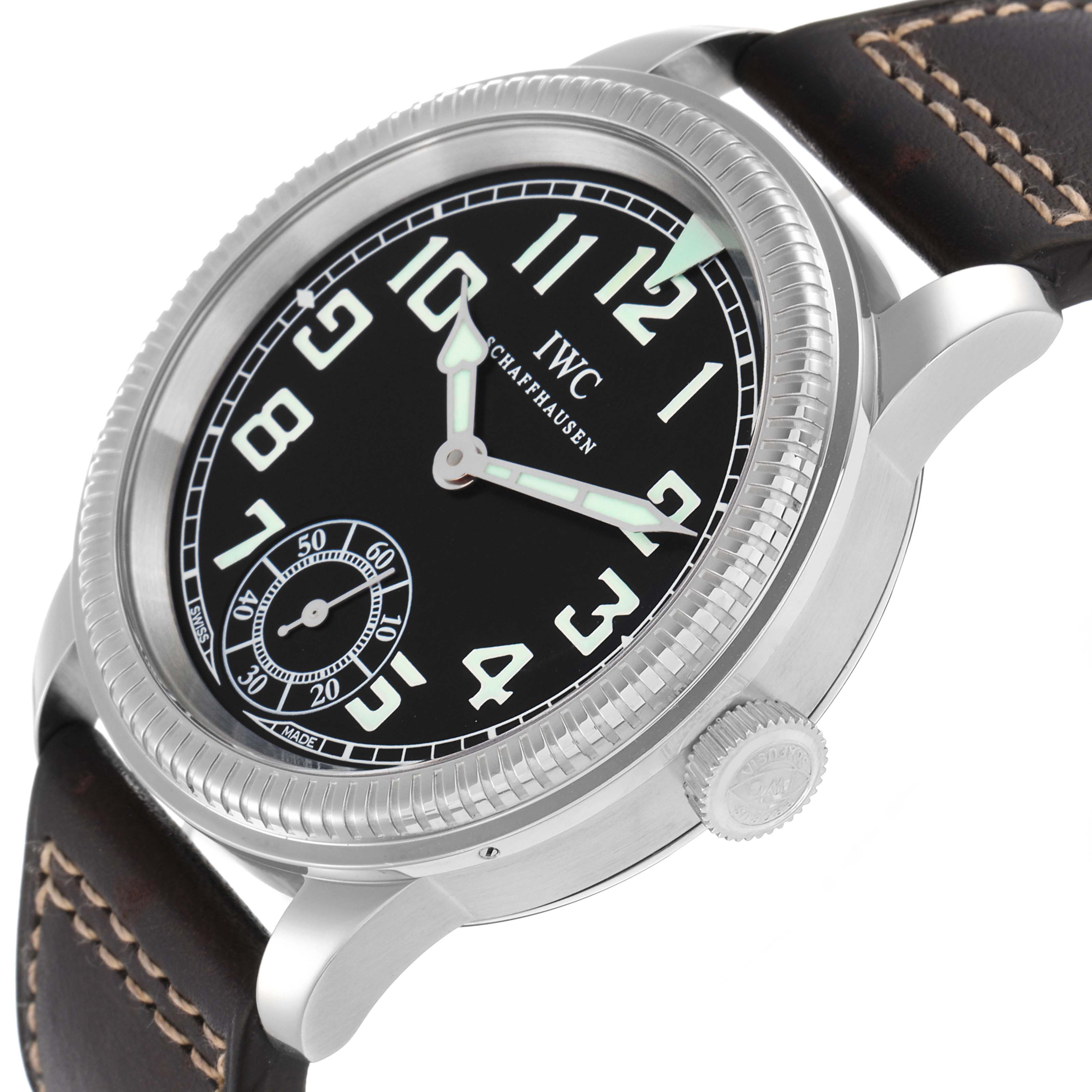 The IWC Pilot IW325401 Men
s Platinum Black Dial watch is shown at a slight angle, highlighting the dial, case, bezel, and crown, with a focus on the front left side.