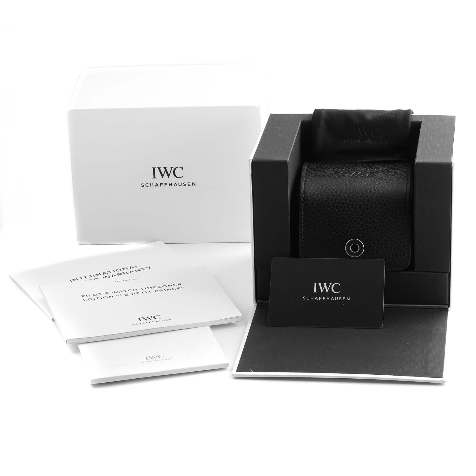The image shows the packaging, warranty card, and booklets for the IWC Pilot IW395503 Men's Stainless Steel Blue Dial IW395503 Men's Stainless Steel Blue Dial model watch from an angled top view.