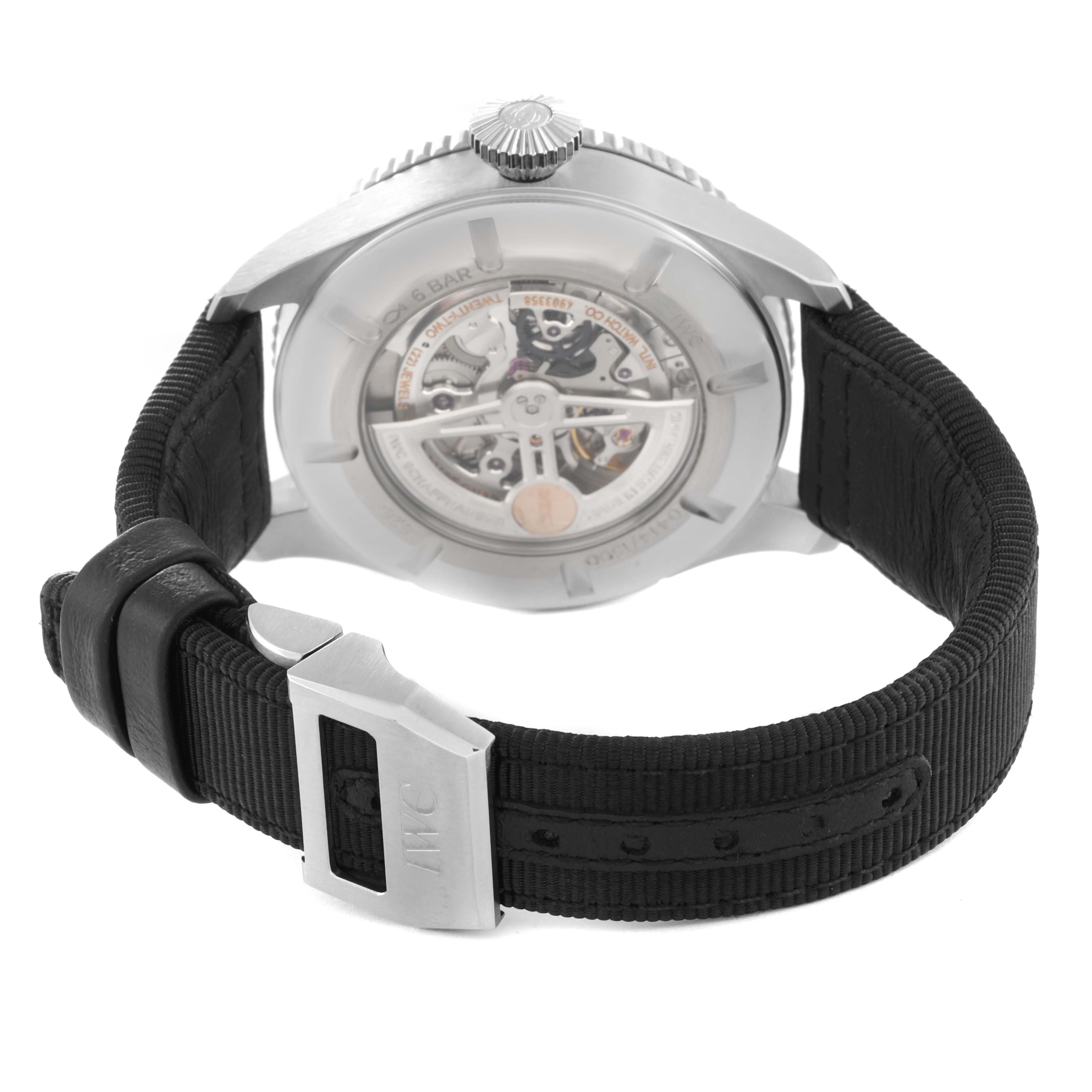 The image shows the back of the IWC Pilot IW395503 Men's Stainless Steel Blue Dial IW395503 Men's Stainless Steel Blue Dial watch model, highlighting the movement and black strap with a branded clasp.