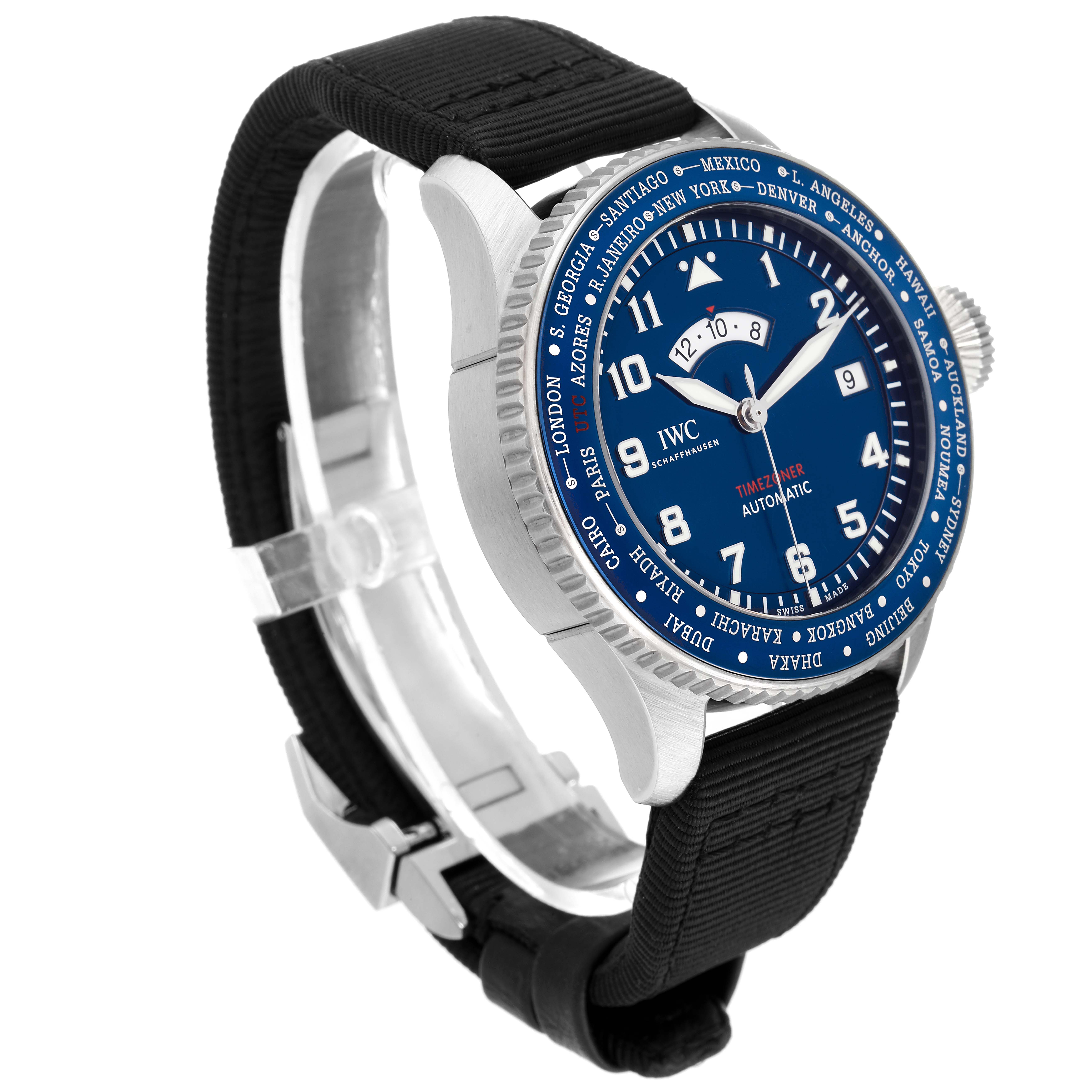 This Pilot model by IWC is shown at an oblique angle, displaying the watch face, bezel, crown, and part of the strap.