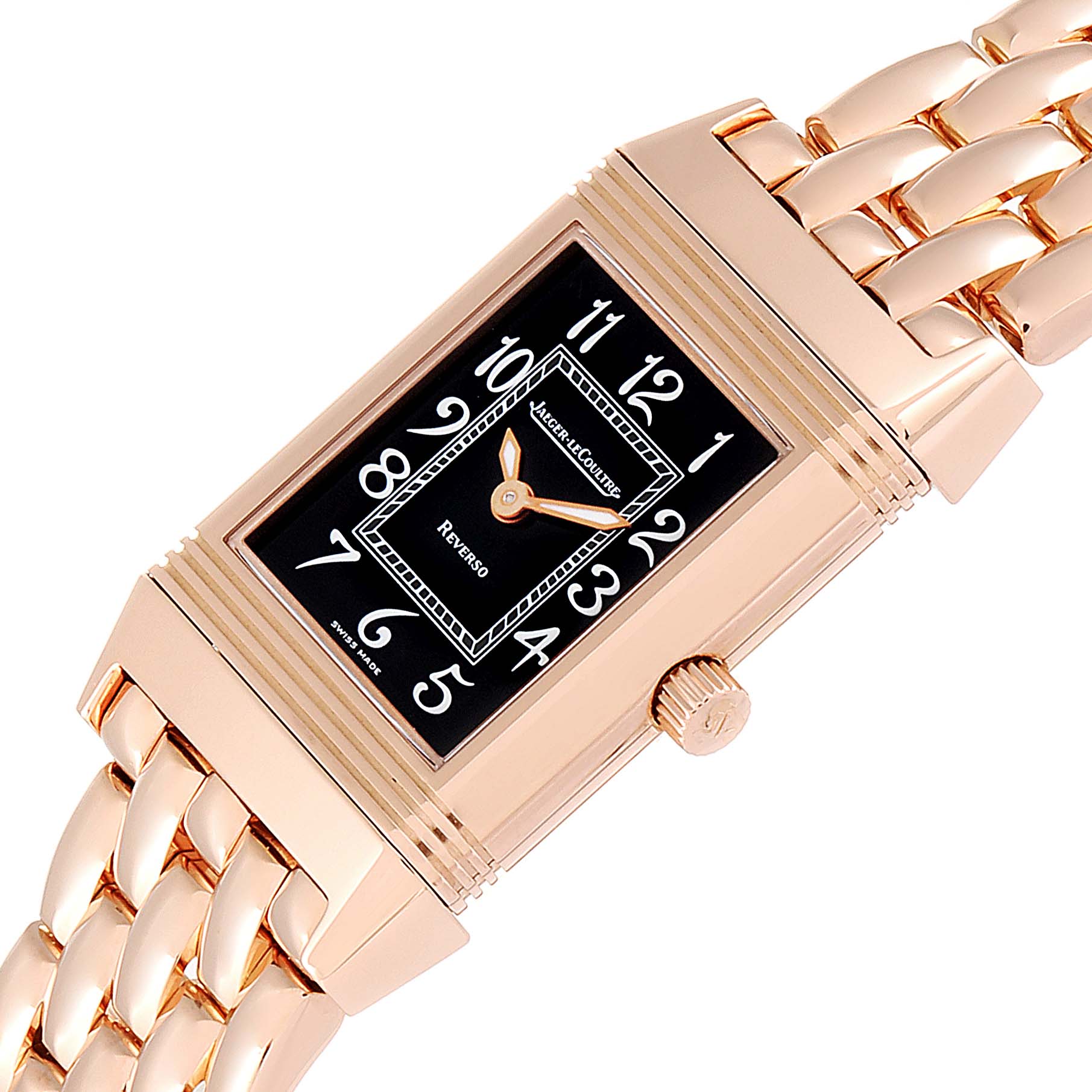 The image shows a Jaeger-LeCoultre Reverso model watch, highlighting its rectangular dial, gold case, and gold link bracelet, angled slightly to the right.