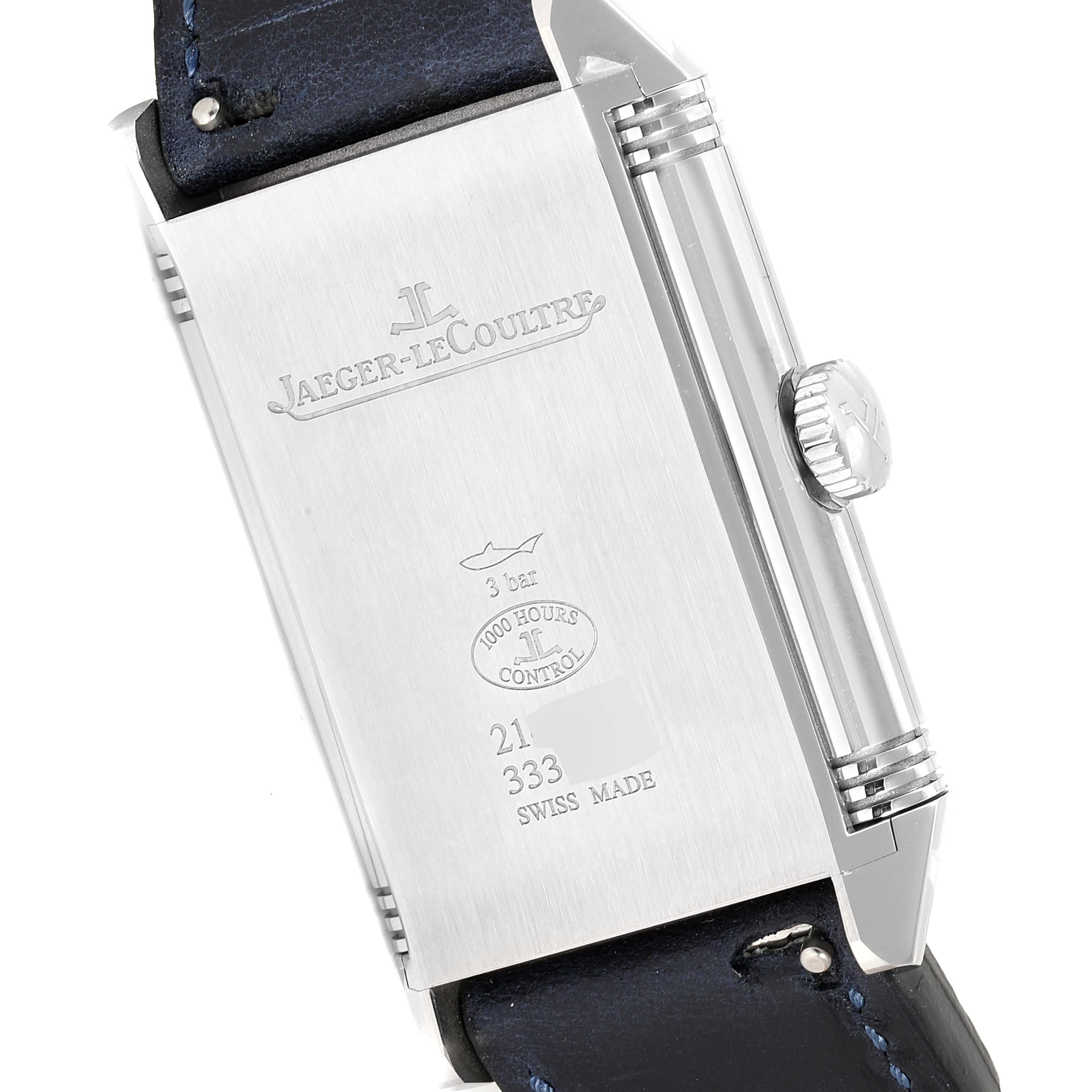 The image shows the back of the Jaeger LeCoultre Reverso Q3978480 Men's Stainless Steel Blue Dial Q3978480 Men's Stainless Steel Blue Dial watch, showcasing its case back engravings and a portion of the strap.