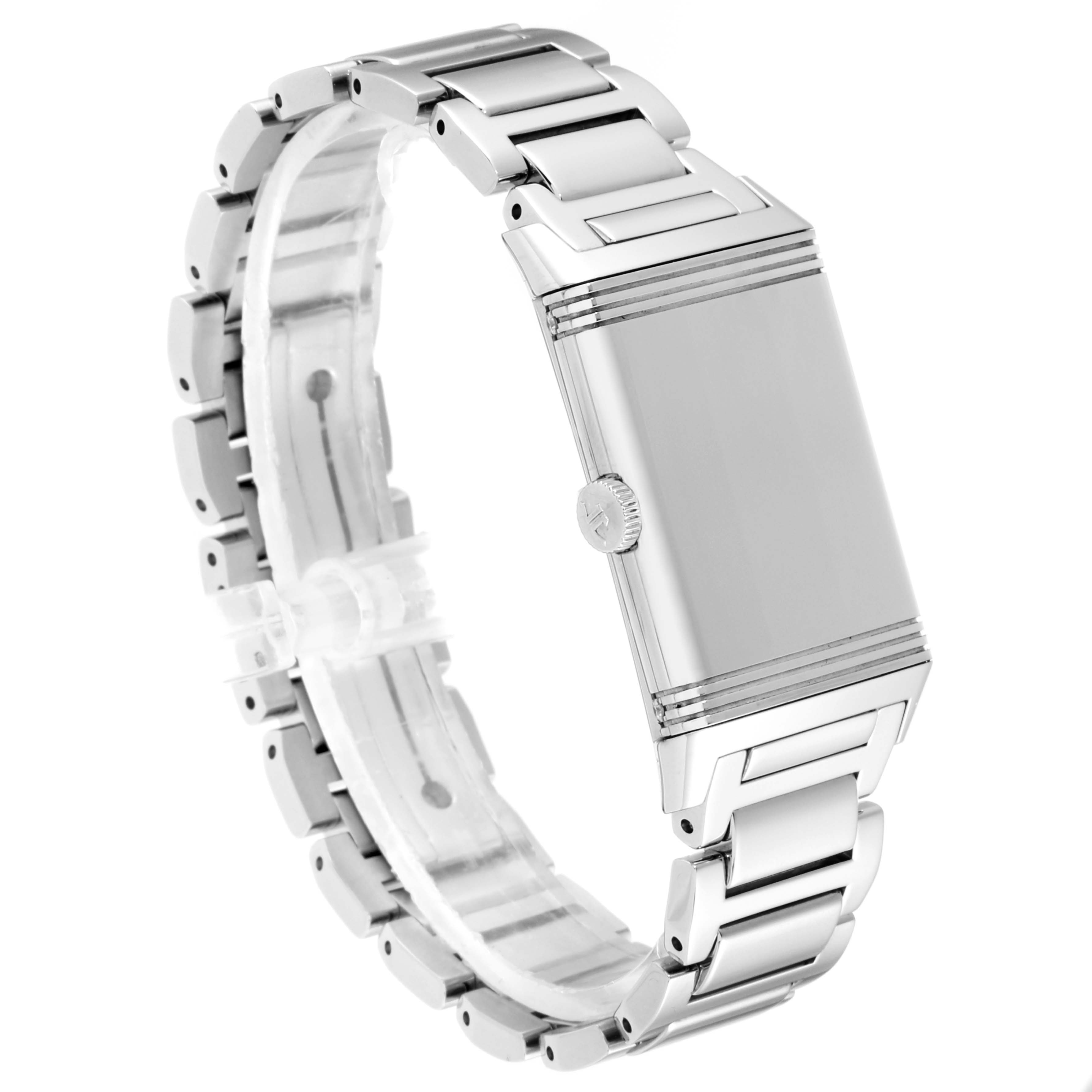 The image shows a side view of a Jaeger-LeCoultre Reverso watch, highlighting its stainless steel case and bracelet.