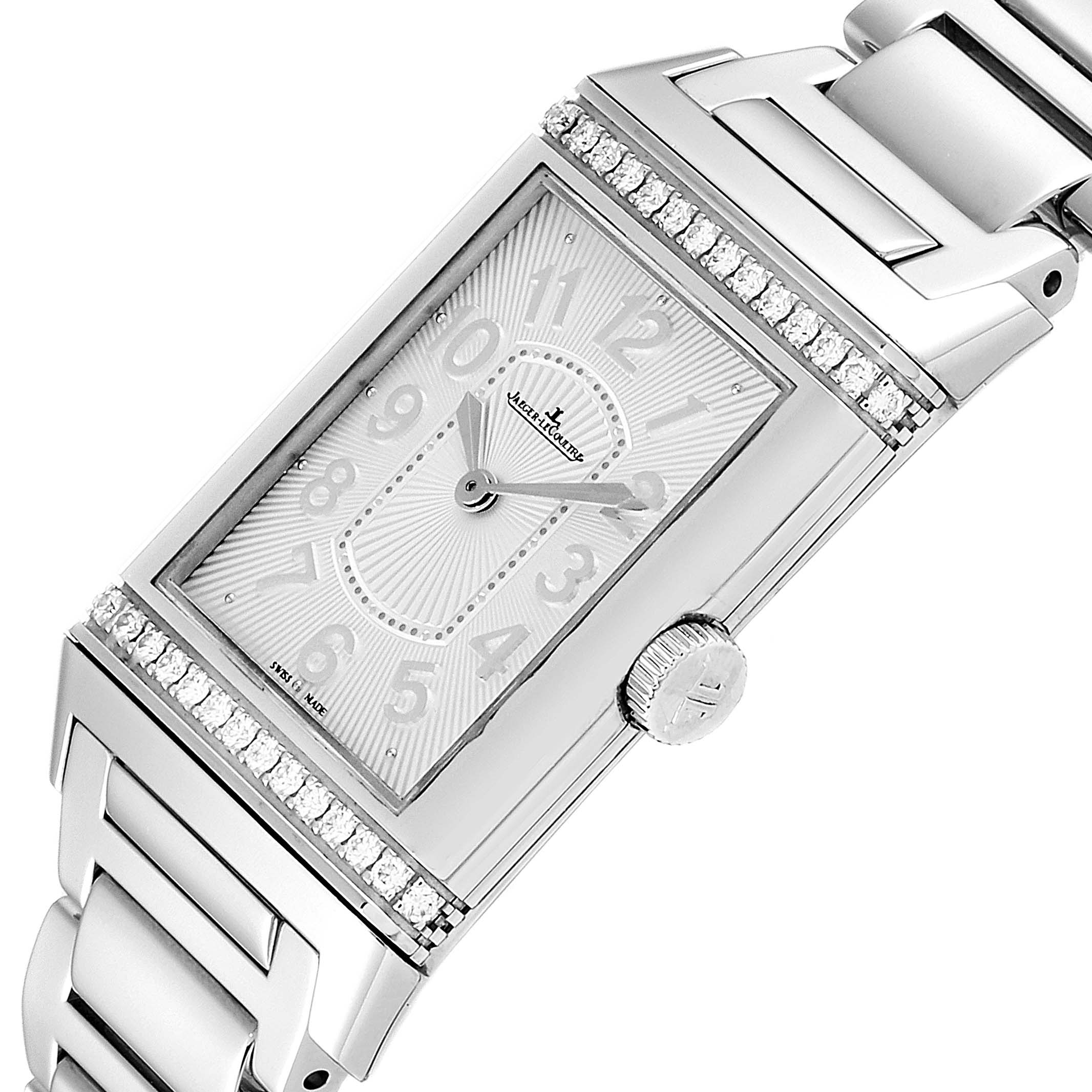 A close-up view of the face and crown of a Jaeger-LeCoultre Reverso watch with a metal bracelet and diamond accents.