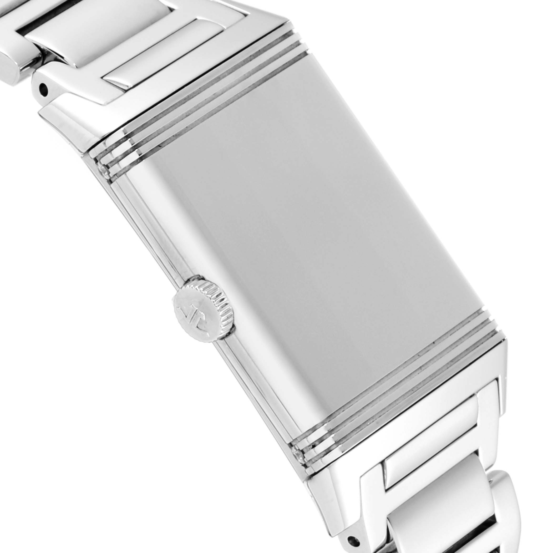 Side angle of the Jaeger LeCoultre Reverso Q3208121 Women's Stainless Steel Silver Dial Q3208121 Women's Stainless Steel Silver Dial showing the crown and part of the metal bracelet.