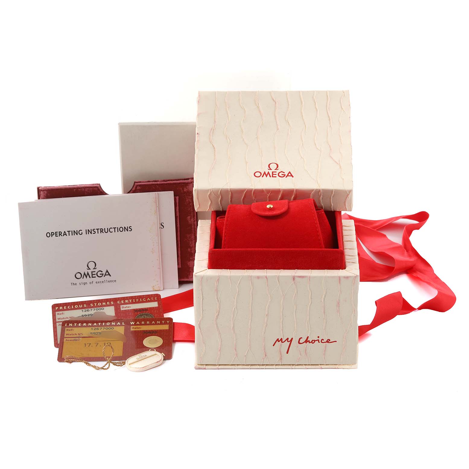 The image shows the Omega 1267.70.00 Women's Steel and Gold (two tone) Mother of Pearl Dial 1267.70.00 Women's Steel and Gold (two tone) Mother of Pearl Dial Constellation Steel Yellow Gold Mother of Pearl Diamond Watch 1267.70.00 with its box, card, and instructions.