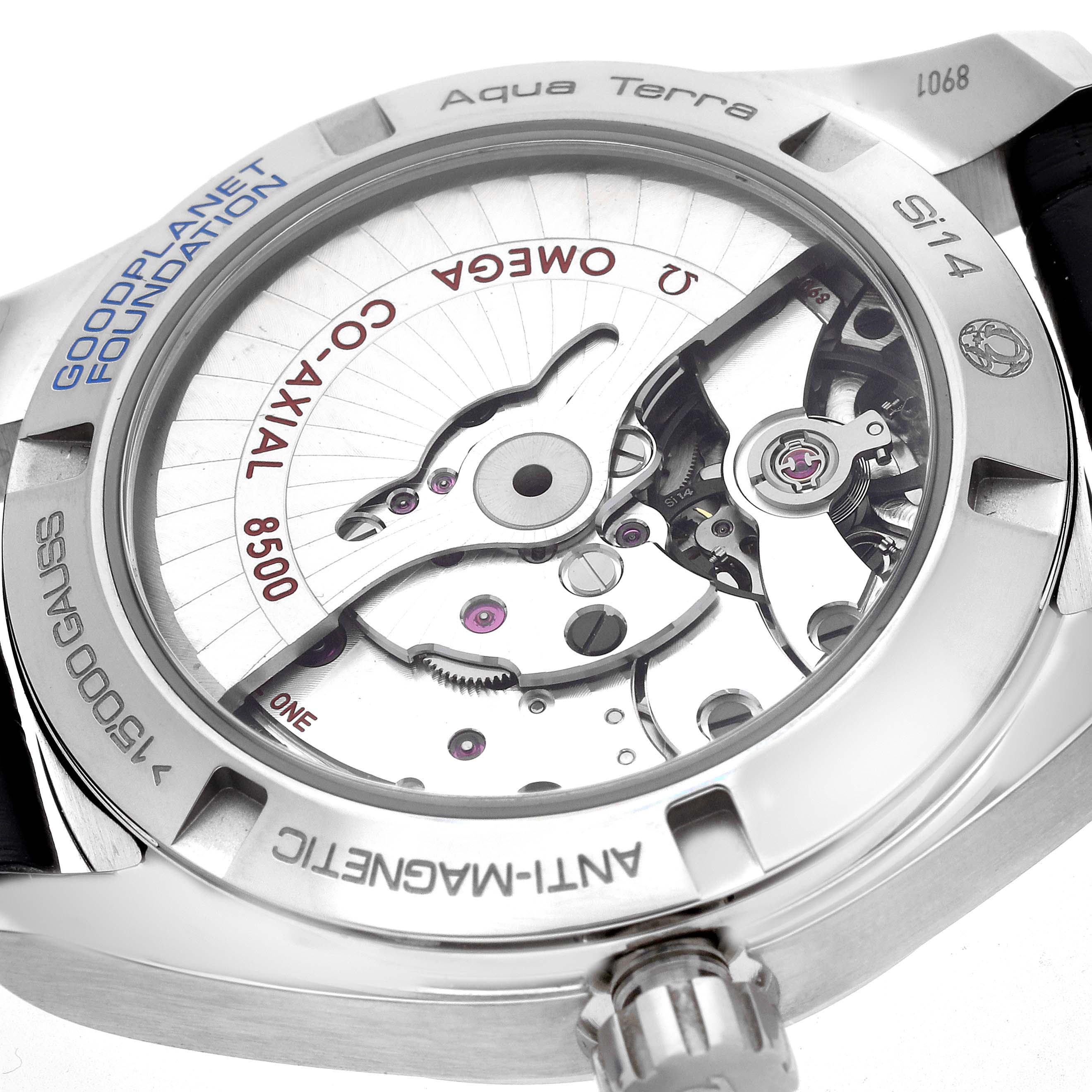 The image shows the back of the Omega Aqua Terra 231.92.39.21.04.001 Men
s Titanium White Dial watch, highlighting its movement and co-axial mechanism.