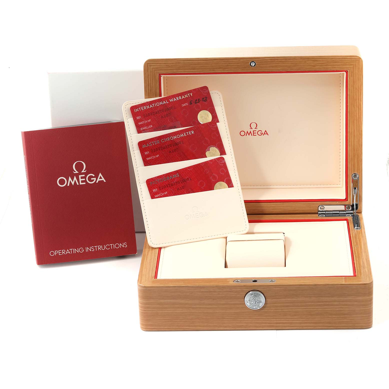 The image shows an Omega Seamaster 210.32.42.20.10.001 Men
s Stainless Steel Green Dial 210.32.42.20.10.001 Men
s Stainless Steel Green Dial watch box, warranty cards, and operating instructions from a front angle.