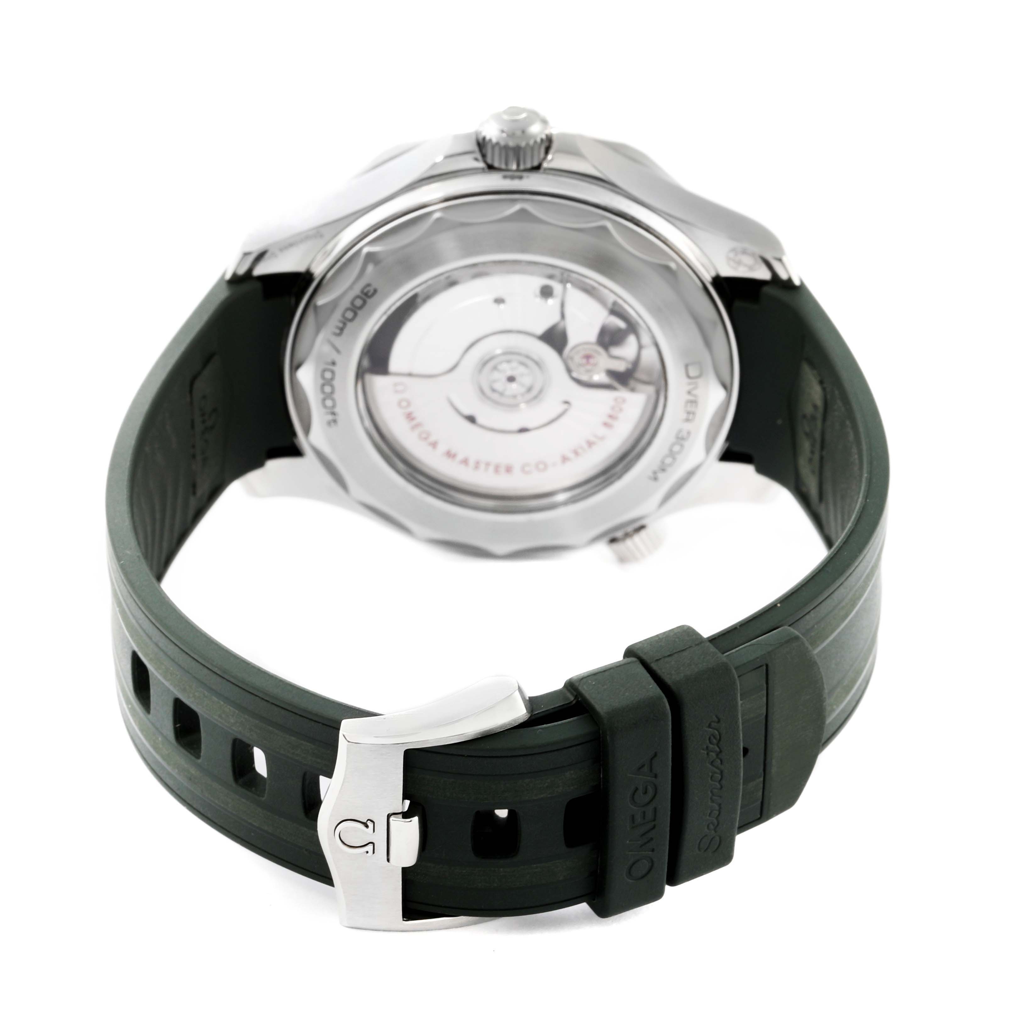 The image shows the back view of an Omega Seamaster 210.32.42.20.10.001 Men
s Stainless Steel Green Dial 210.32.42.20.10.001 Men
s Stainless Steel Green Dial watch, focusing on its transparent case back and green strap with the buckle visible.