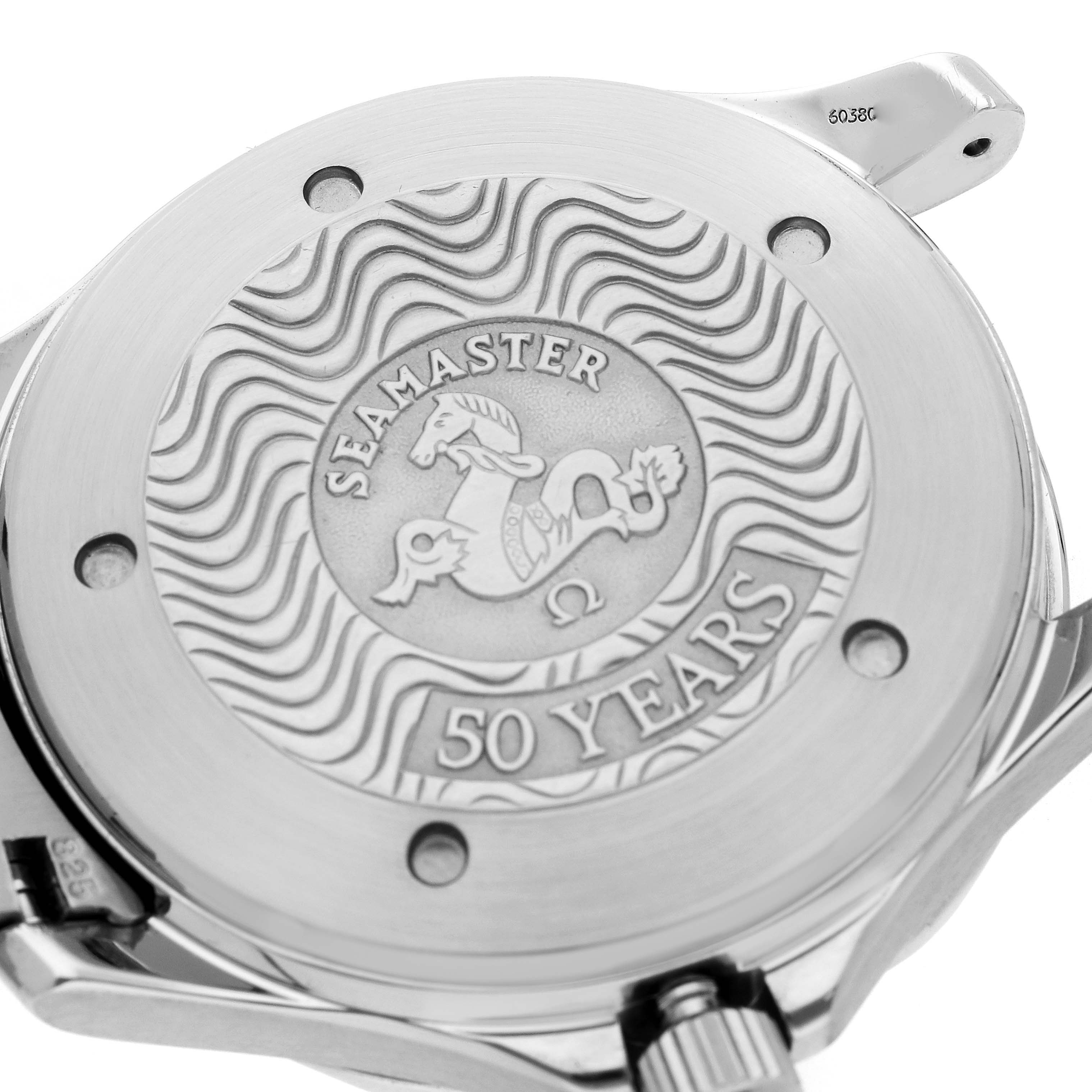 The Omega Seamaster 2534.50.00 Men
s Stainless Steel Black Dial watch is shown from a low angle, highlighting the engraved case back commemorating "50 Years."