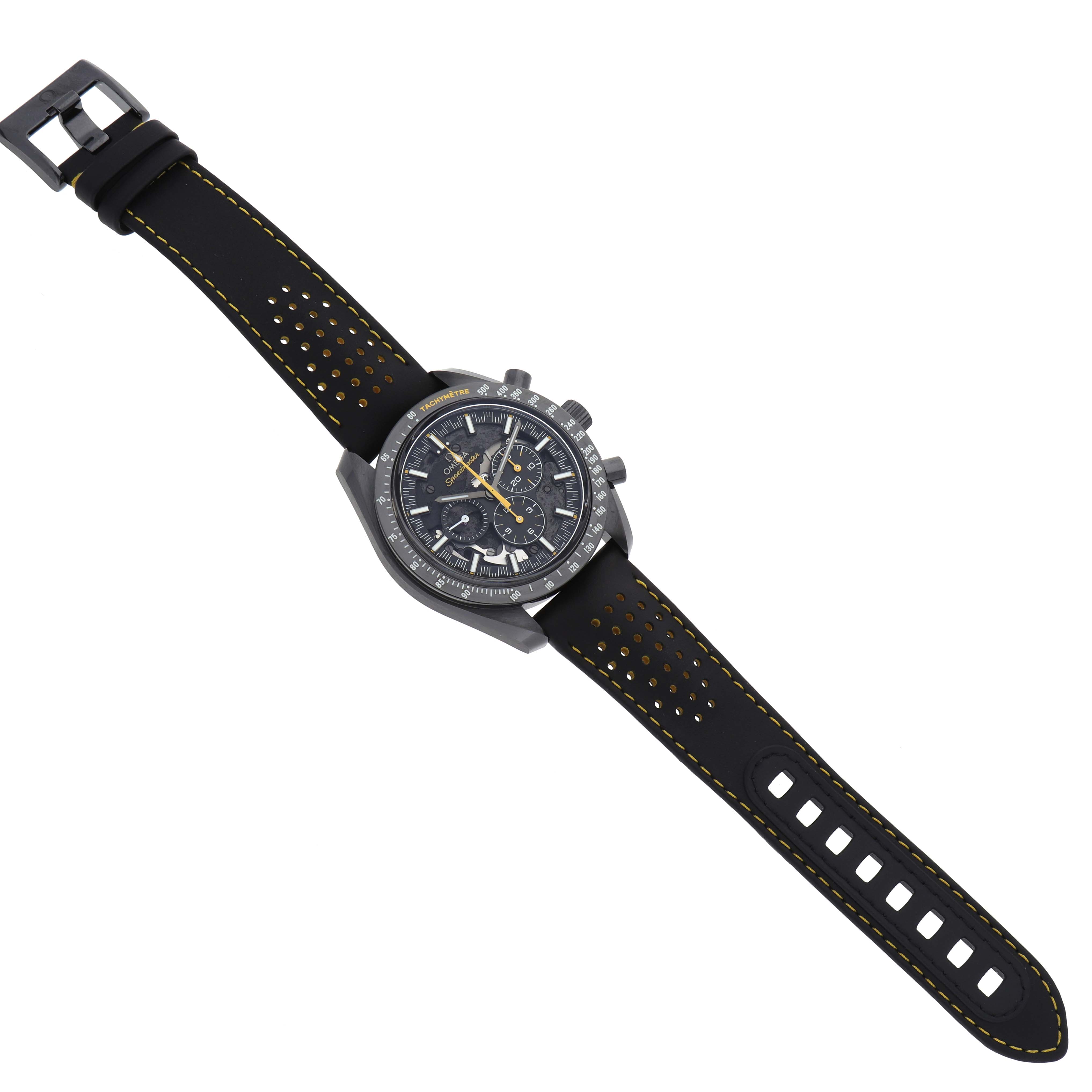 The Omega Speedmaster 311.92.44.30.01.001 Men
s Ceramic Black Dial watch is shown from a top view, displaying its face, strap, and buckle.