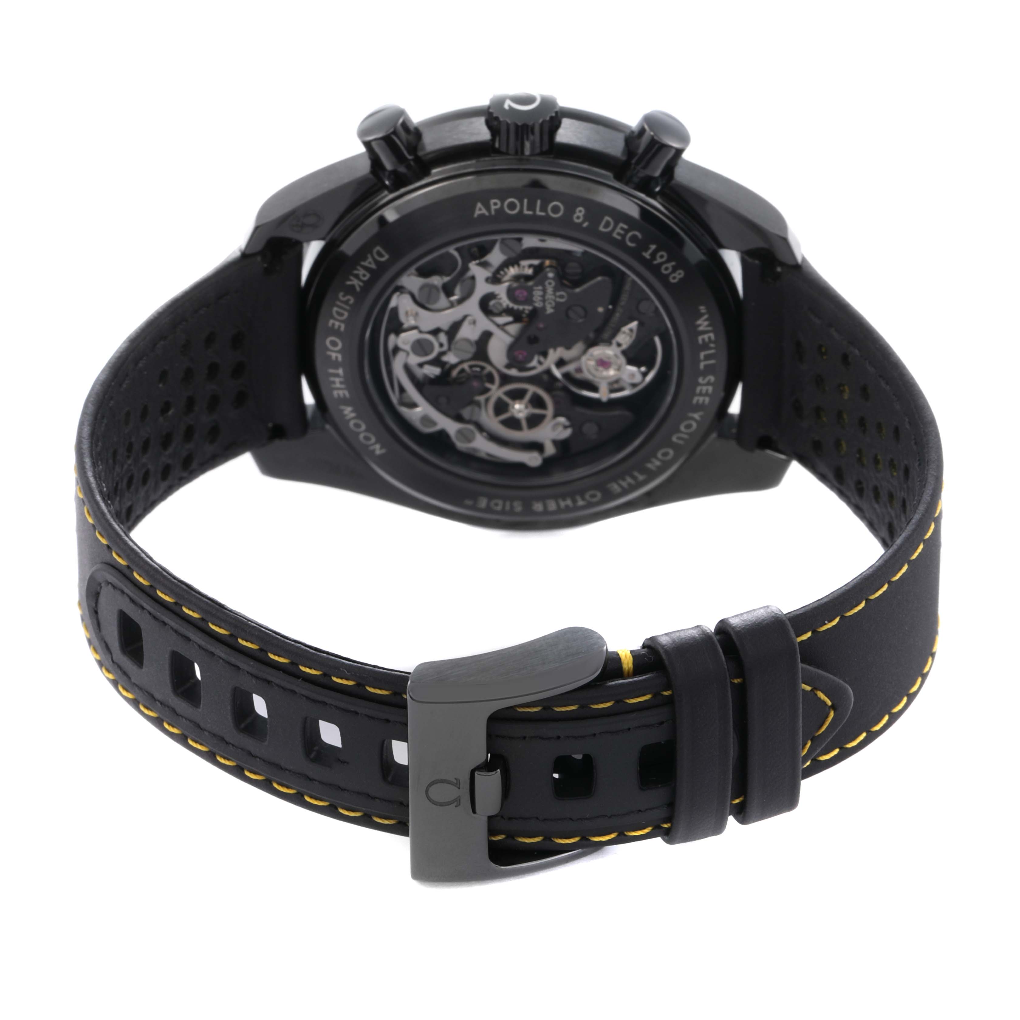 The Omega Speedmaster 311.92.44.30.01.001 Men
s Ceramic Black Dial watch is shown from the back, highlighting the exhibition case back and strap buckle.