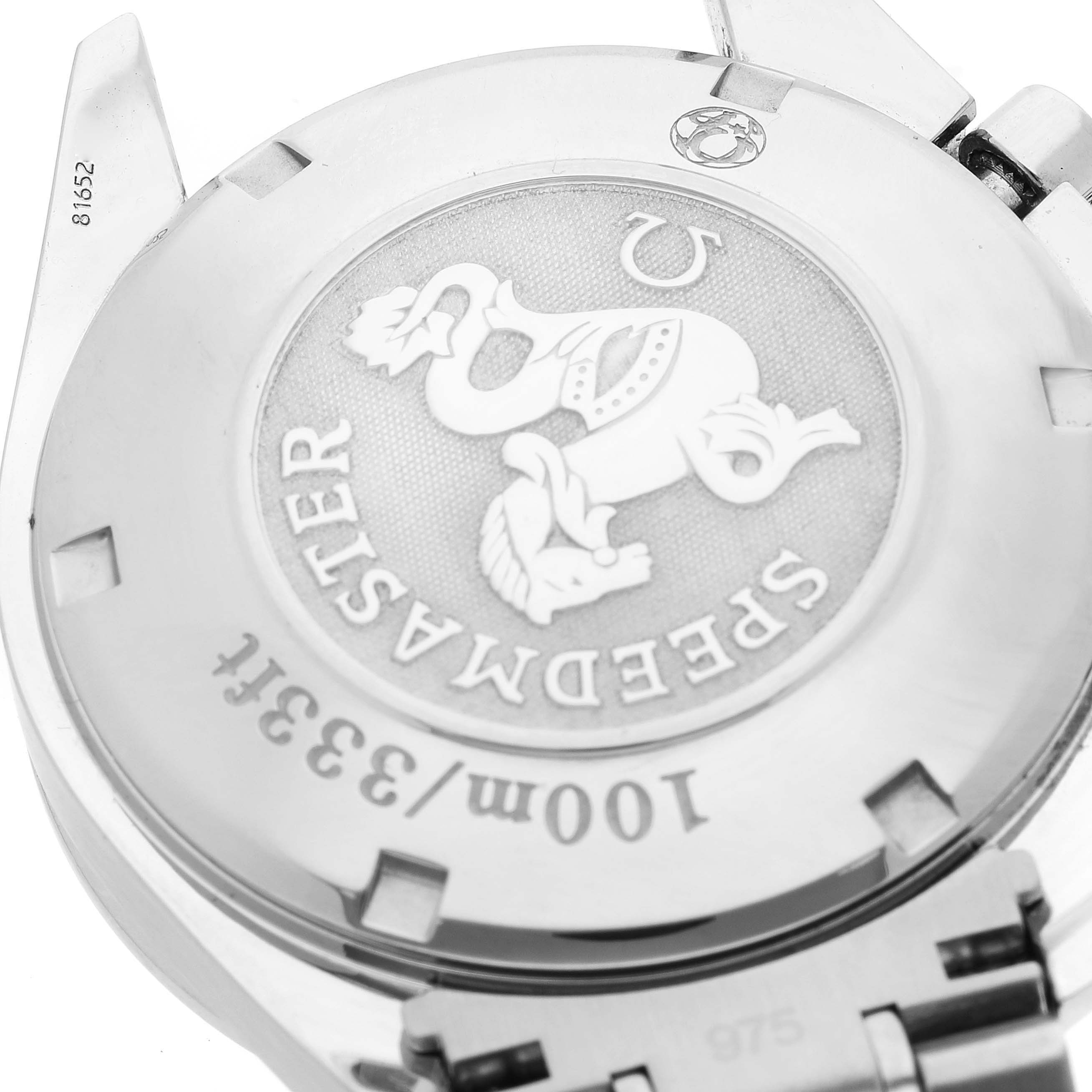 This image shows the back case of the Omega Speedmaster 3210.50.00 Men
s Stainless Steel Black Dial 3210.50.00 Men
s Stainless Steel Black Dial watch, highlighting its emblem and part of the bracelet.