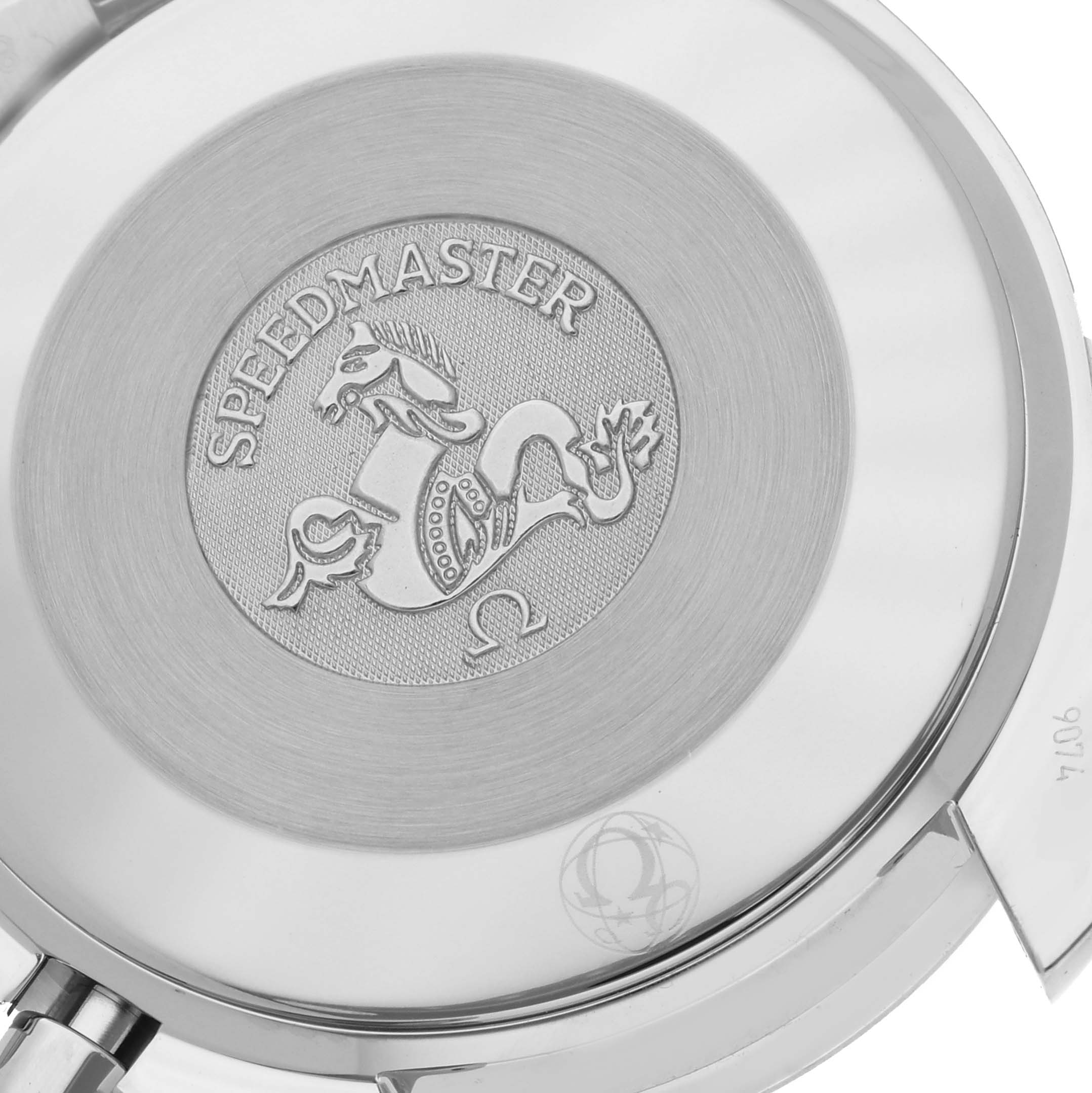 The image shows the engraved case back of an Omega Speedmaster 3534.72.00 Men's Stainless Steel Mother of Pearl Dial 3534.72.00 Men's Stainless Steel Mother of Pearl Dial watch, highlighting its logo and emblem.