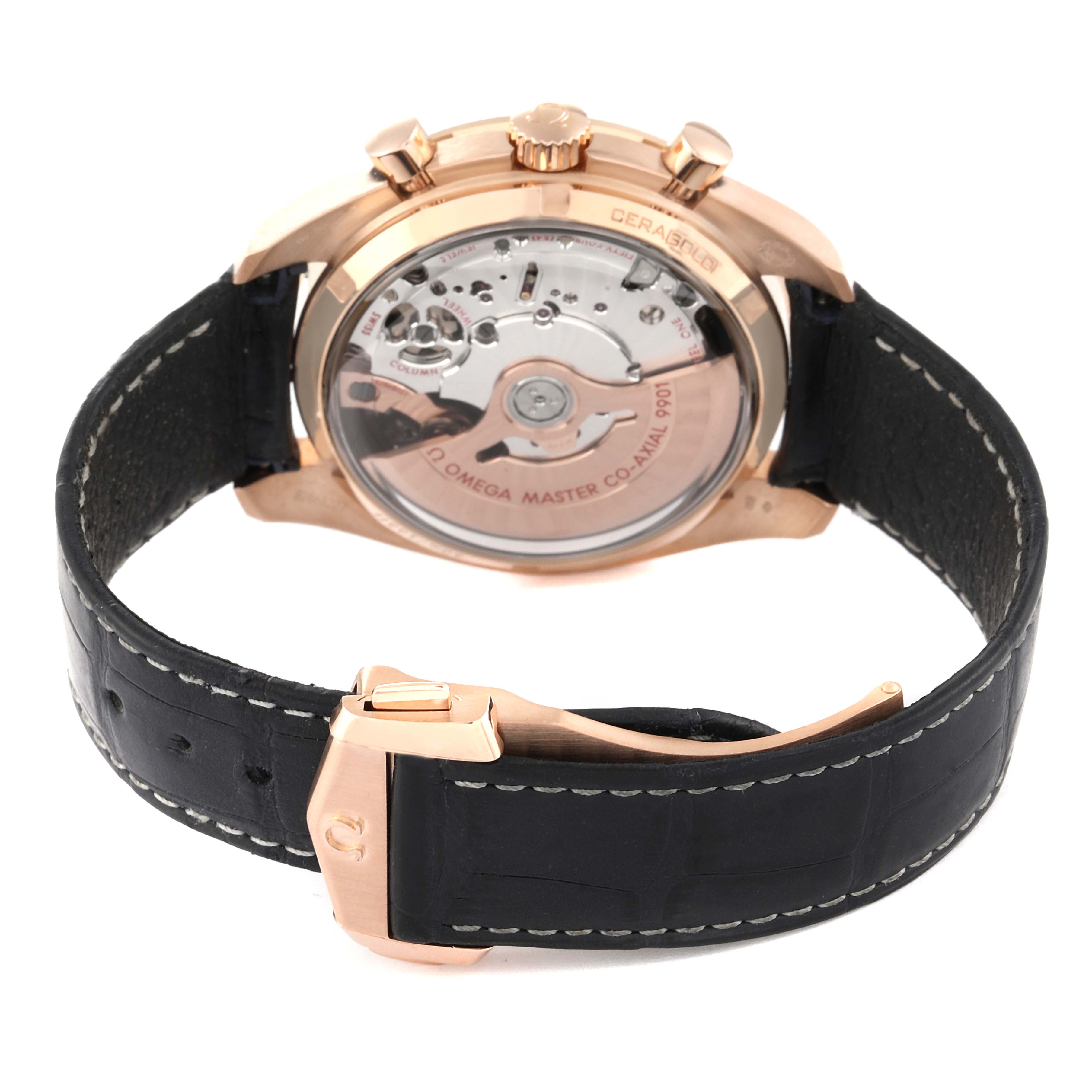 The image shows the back view of an Omega Speedmaster 329.53.44.51.03.001 Men's Rose Gold Blue Dial 329.53.44.51.03.001 Men's Rose Gold Blue Dial watch, highlighting its movement through a transparent case back.