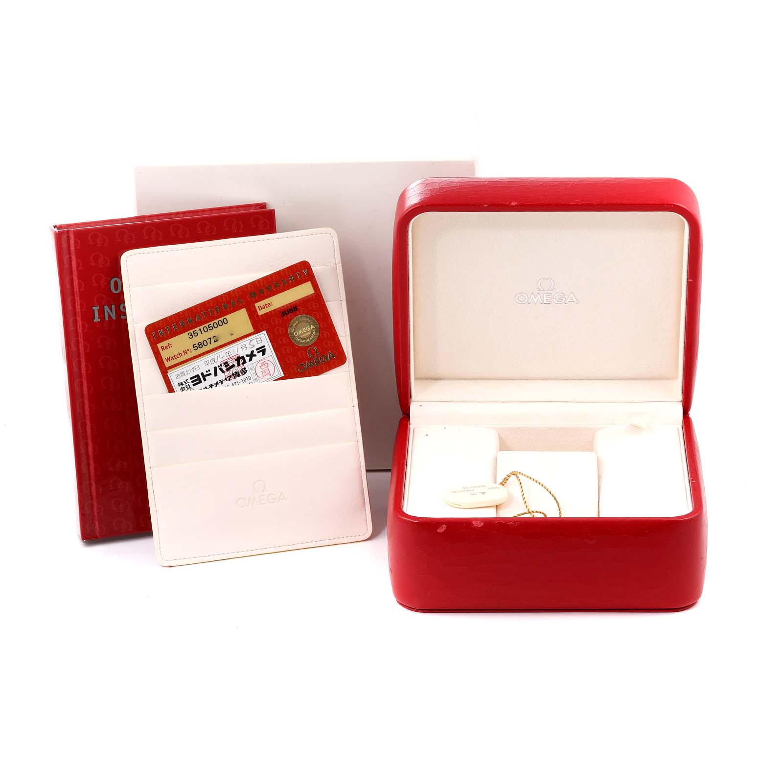 The image shows the packaging and accessories for an Omega Speedmaster 3510.50.00 Men
s Stainless Steel Black Dial 3510.50.00 Men
s Stainless Steel Black Dial, including the watch box, warranty card, and instruction manual.