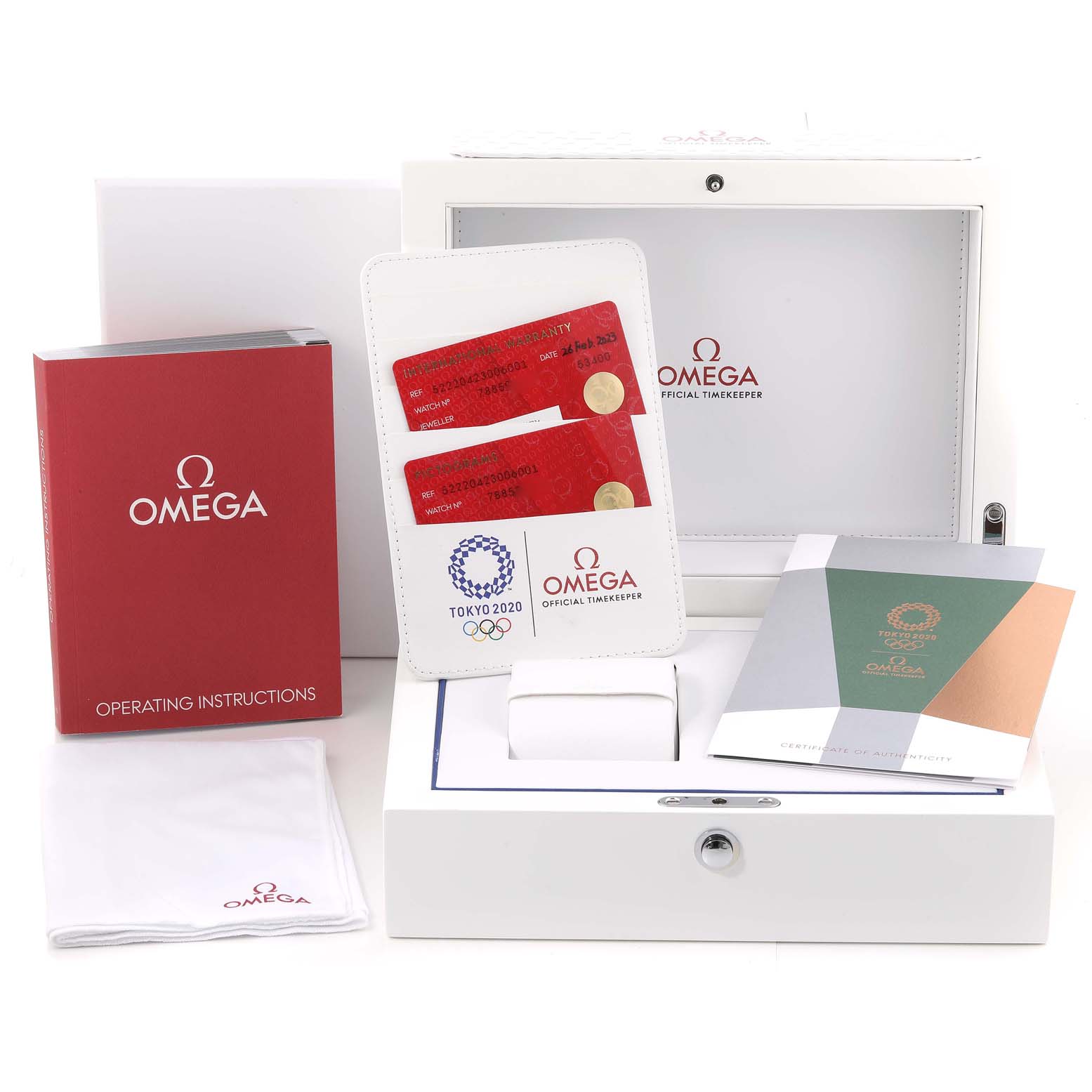 The image shows an Omega Speedmaster 522.20.42.30.06.001 Men's Stainless Steel Grey Dial 522.20.42.30.06.001 Men's Stainless Steel Grey Dial watch box, instruction manual, warranty cards, and certificates, captured from a front angle.