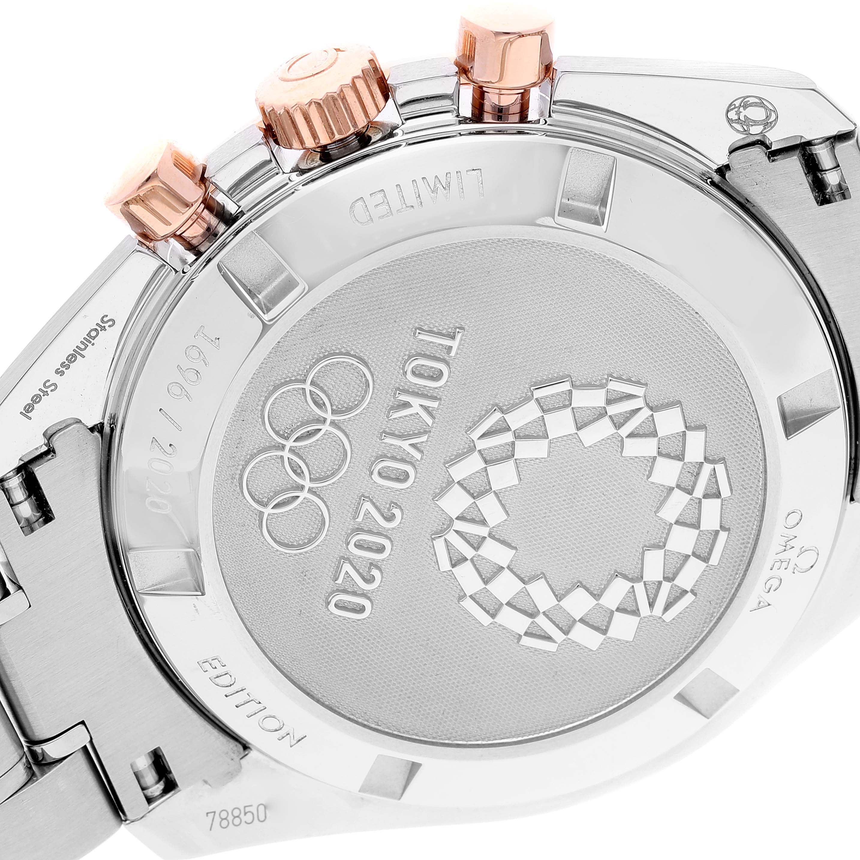 This image shows the back case and side view of an Omega Speedmaster 522.20.42.30.06.001 Men's Stainless Steel Grey Dial 522.20.42.30.06.001 Men's Stainless Steel Grey Dial Tokyo 2020 limited edition model.