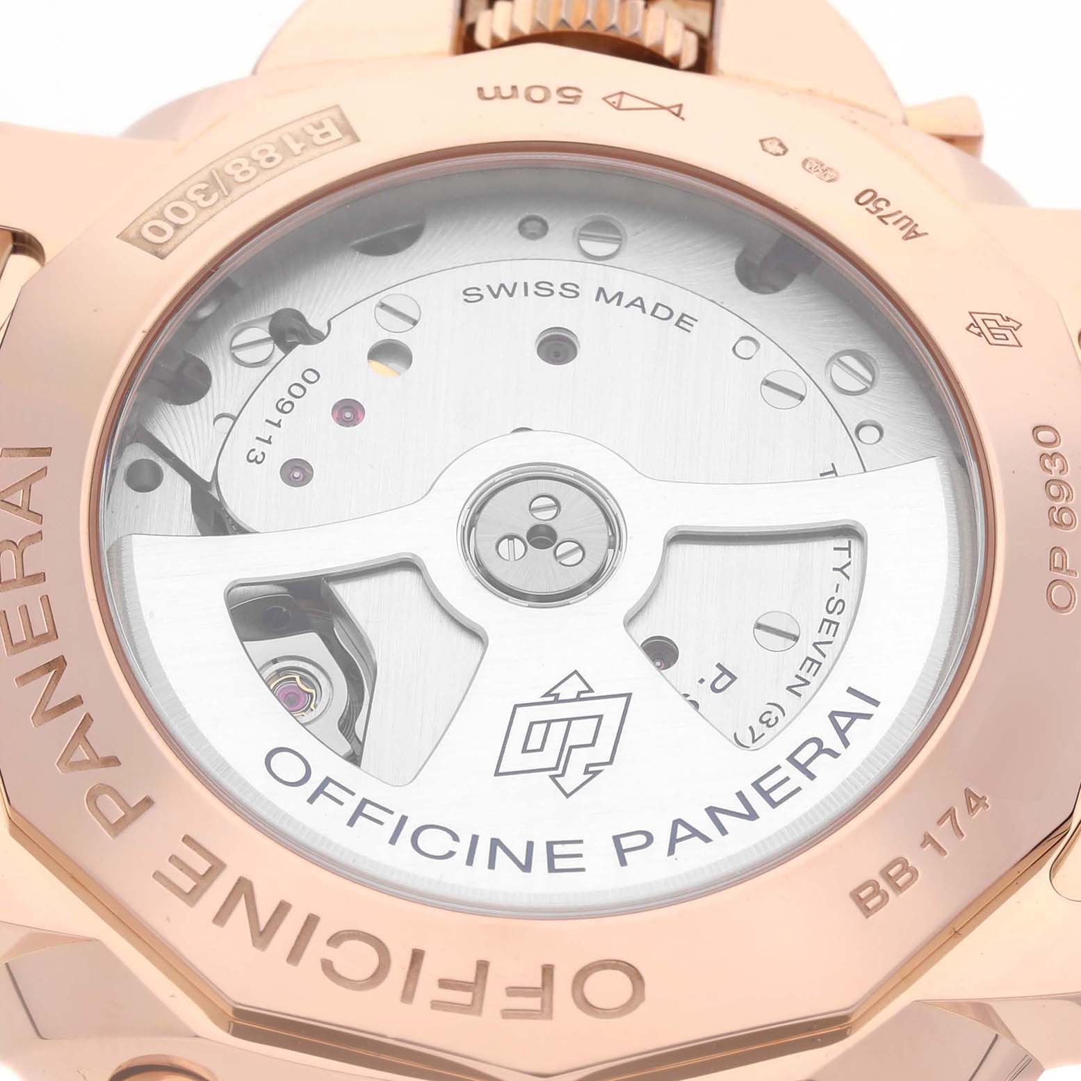 This image shows the back view of the Panerai Luminor PAM00525 Men's Rose Gold Black Dial PAM00525 Men's Rose Gold Black Dial watch, highlighting its intricate movement and "Officine Panerai" engraving.