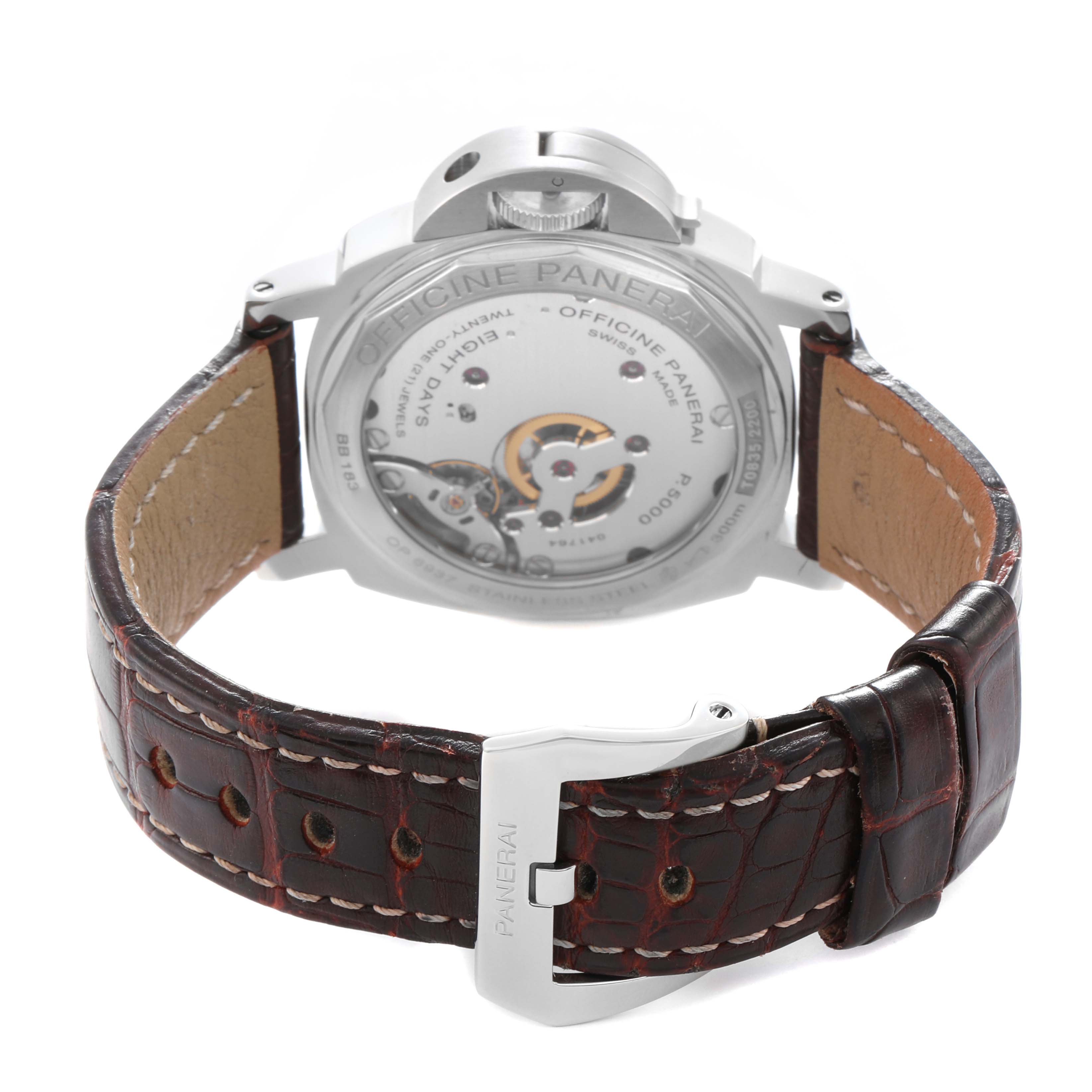 The image shows a Panerai Luminor OP6937 Men
s Stainless Steel Black Dial watch from the back, highlighting its exposed movement and leather strap with a branded clasp.