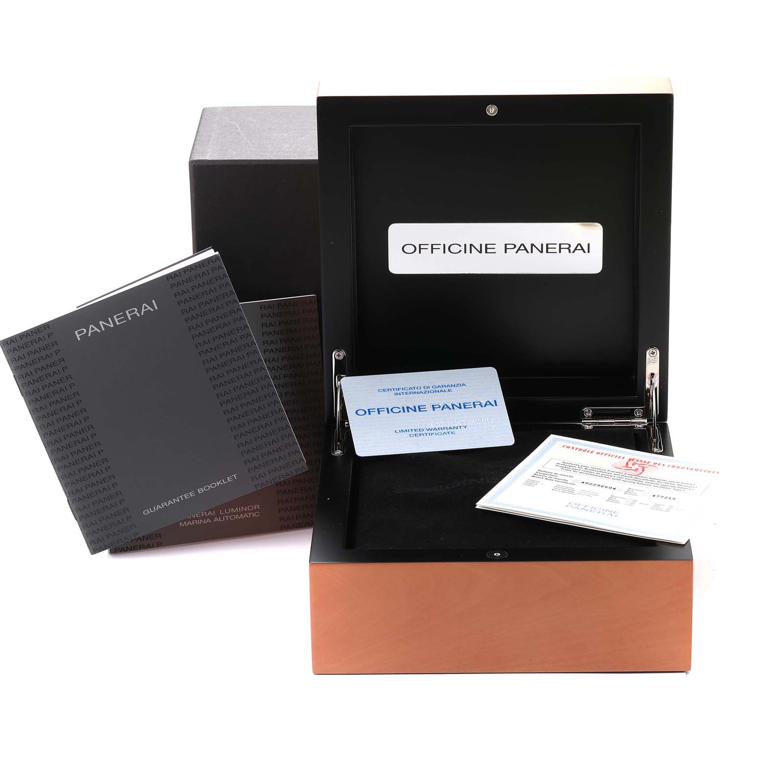 The image shows the watch box, guarantee booklet, and certificates for the Panerai Luminor PAM00048 Men
s Stainless Steel Black Dial PAM00048 Men
s Stainless Steel Black Dial model from an angled perspective.