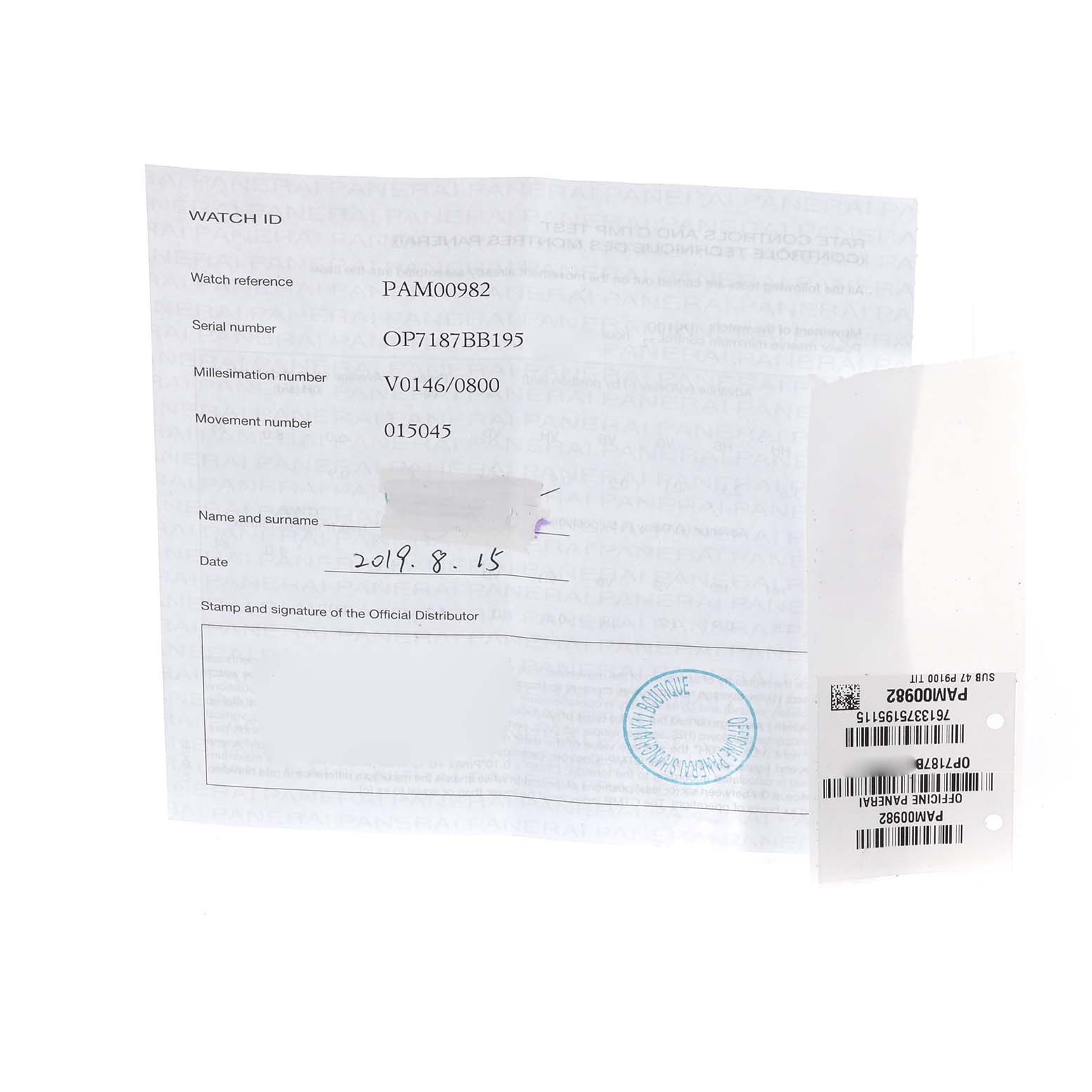 The image shows the documentation and tag for a Panerai Submersible PAM00982 Men's Titanium Grey Dial PAM00982 Men's Titanium Grey Dial model, displaying details like reference and serial numbers.