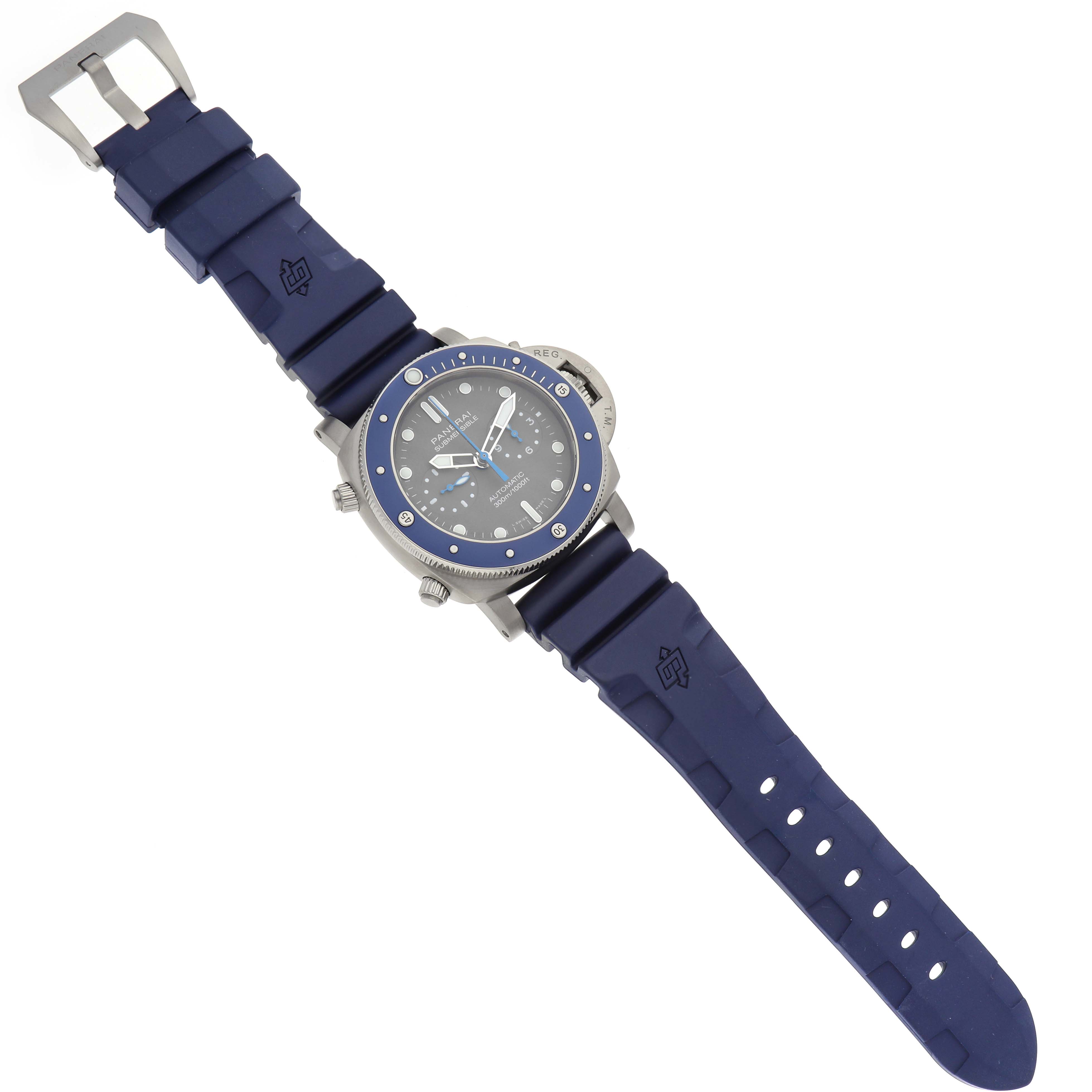 The image shows a top-down view of the Panerai Submersible PAM00982 Men's Titanium Grey Dial PAM00982 Men's Titanium Grey Dial watch with a blue rubber strap and stainless steel buckle.