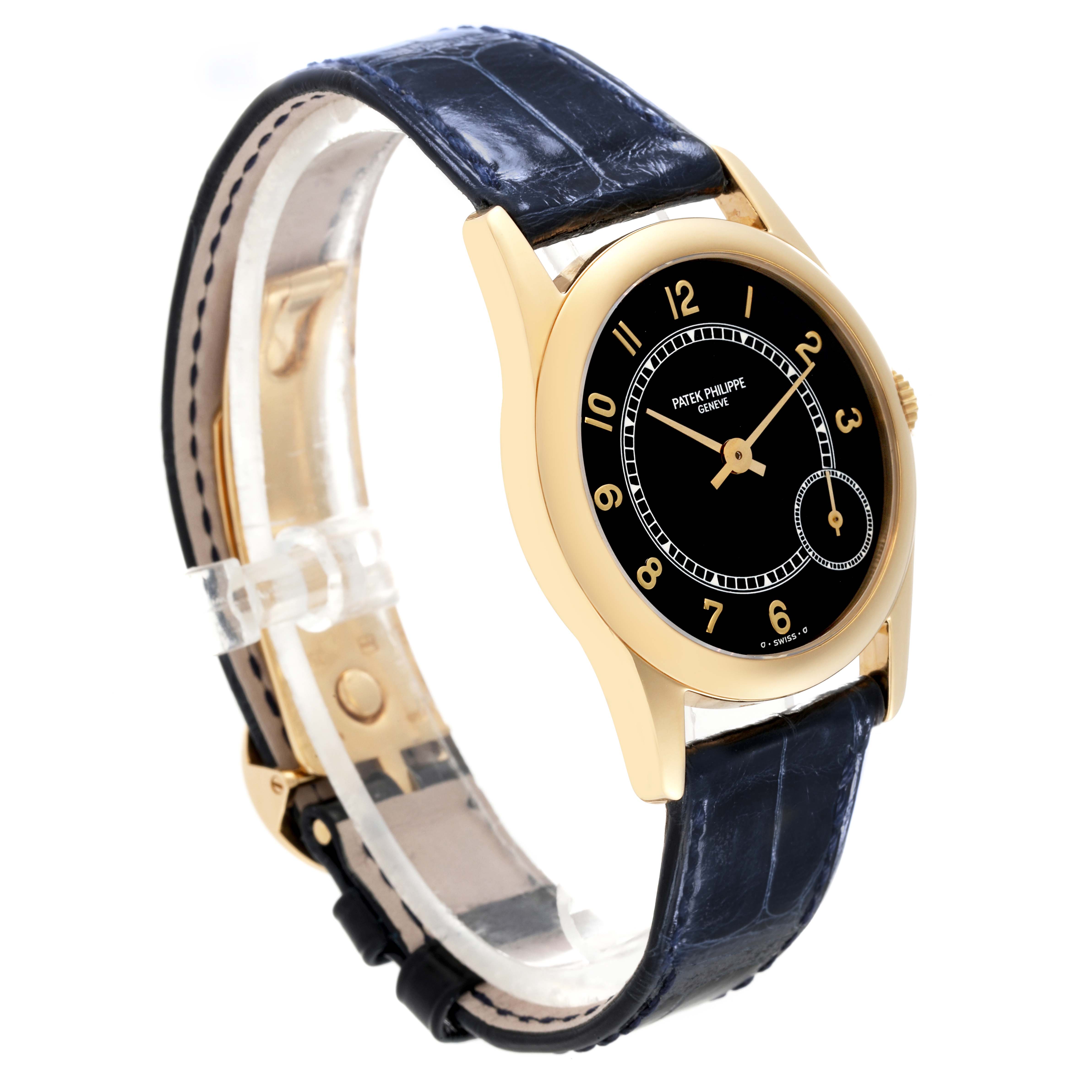 The image shows a Patek Philippe Calatrava 5000J Men's Yellow Gold Black Dial 5000J Men's Yellow Gold Black Dial watch at an angle, highlighting its black dial, gold case, and blue leather strap.