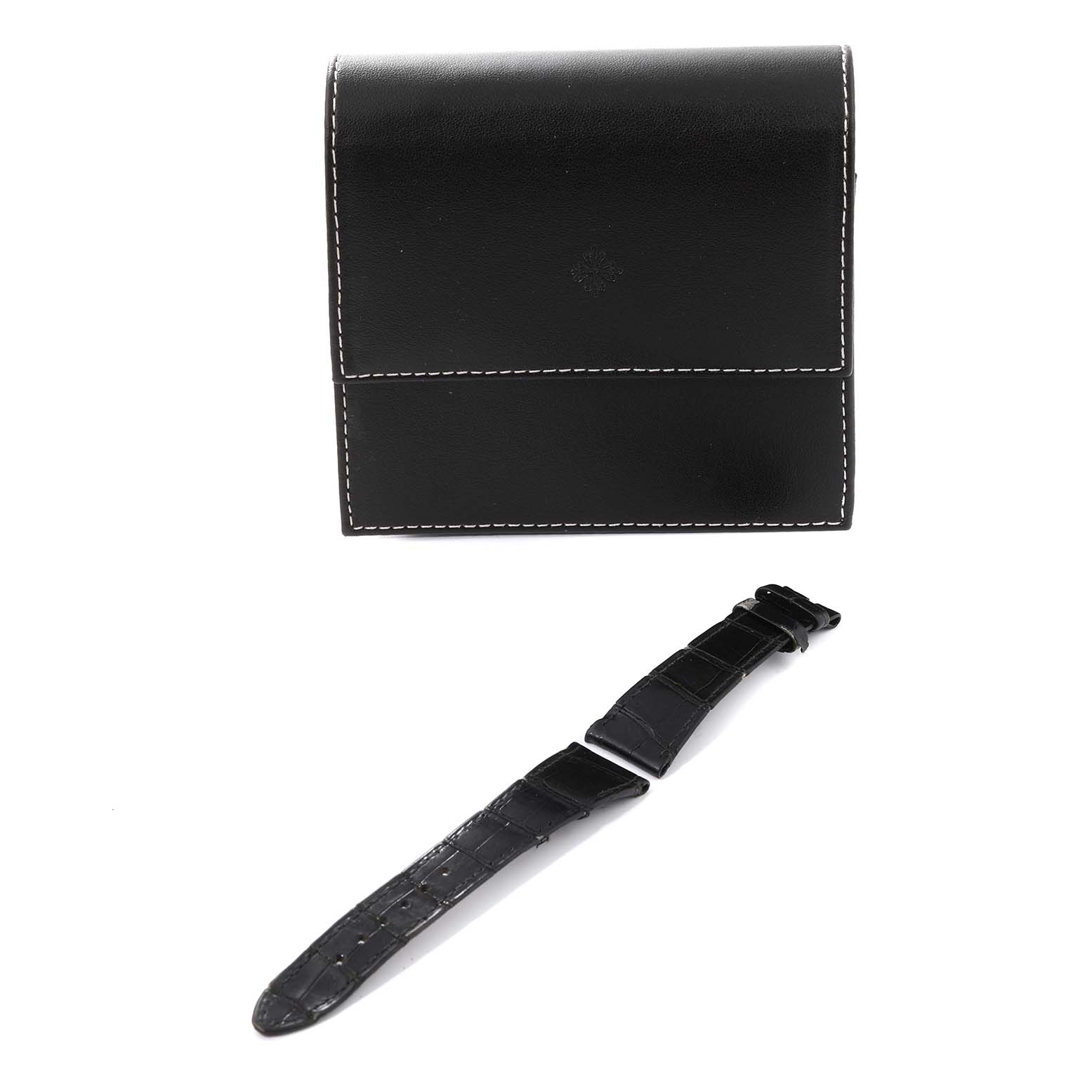 The image shows a replacement strap and a leather case for the Calatrava model by Patek Philippe.