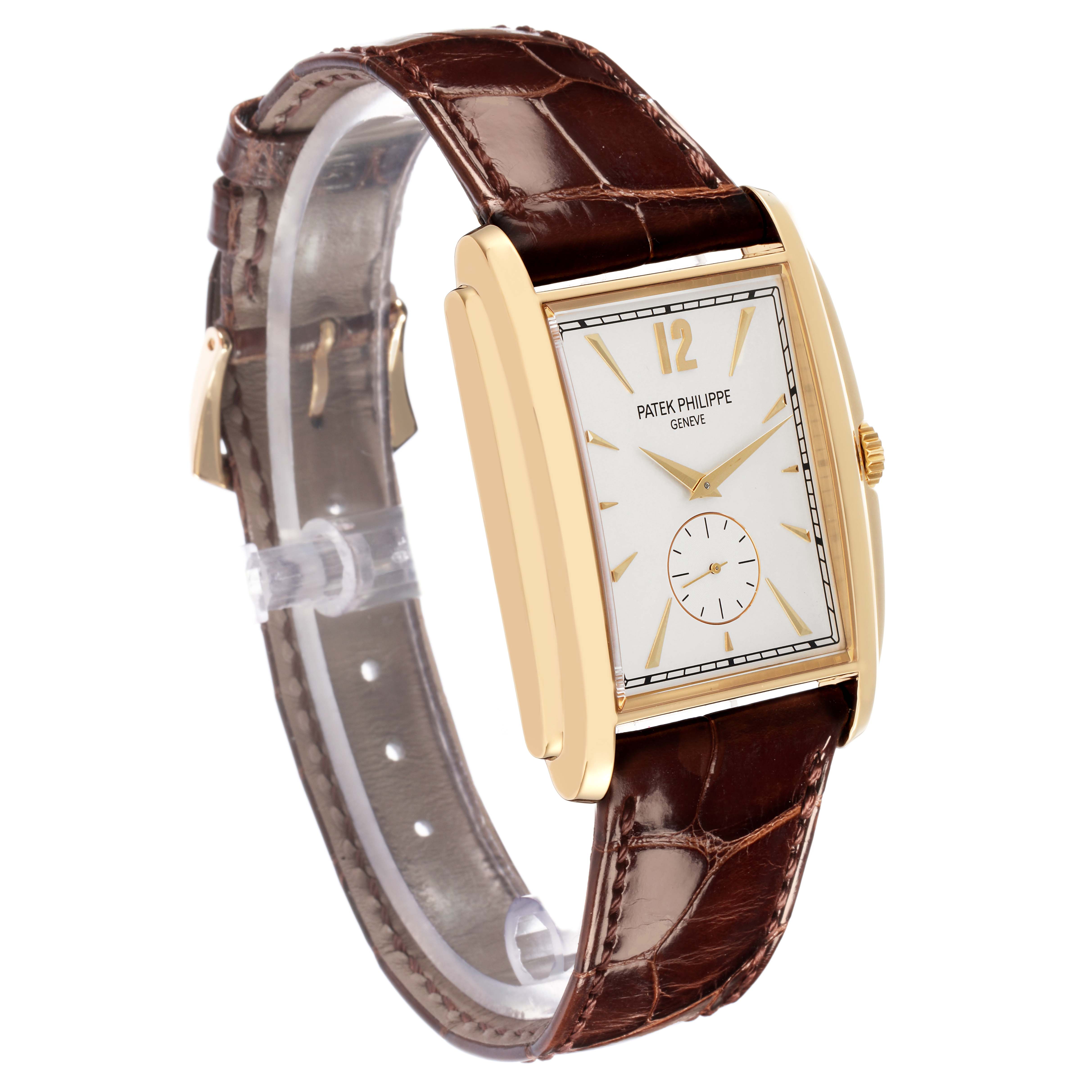 The Patek Philippe Gondolo 5124 Men
s Yellow Gold Silver Dial watch is shown from a front angled view, highlighting its rectangular dial, gold case, and brown leather strap.