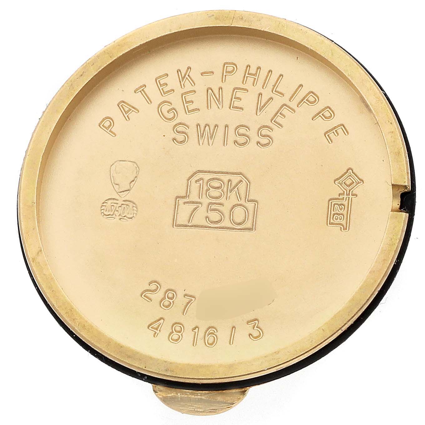 This is the back casing of a Patek Philippe La Flamme  4816/3J Women's Yellow Gold Beige Dial 4816/3J Women's Yellow Gold Beige Dialwatch, showing inscriptions and gold markings.