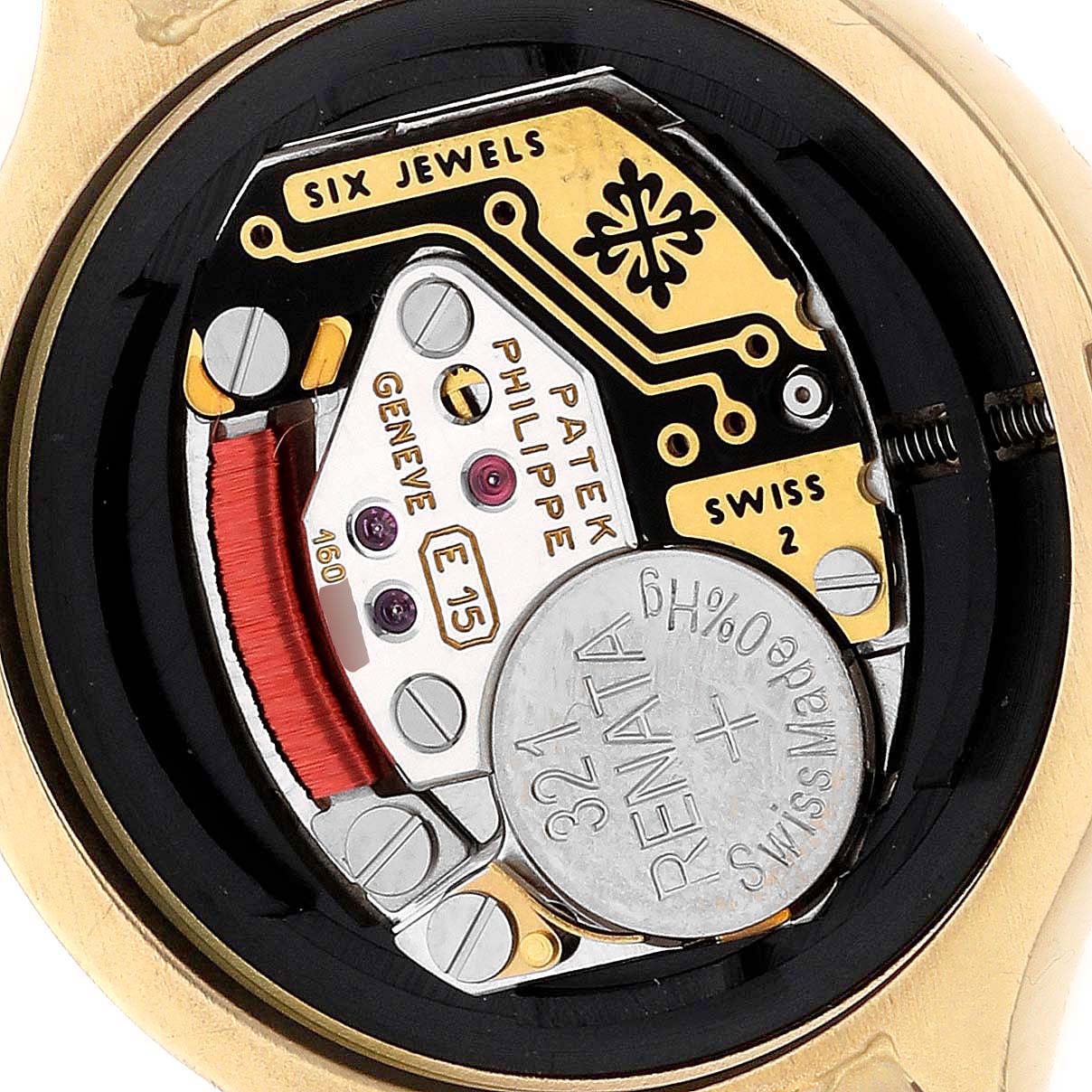 This image shows the interior mechanics and battery of the Patek Philippe La Flamme  4816/3J Women's Yellow Gold Beige Dial 4816/3J Women's Yellow Gold Beige Dialwatch from a close-up angle.