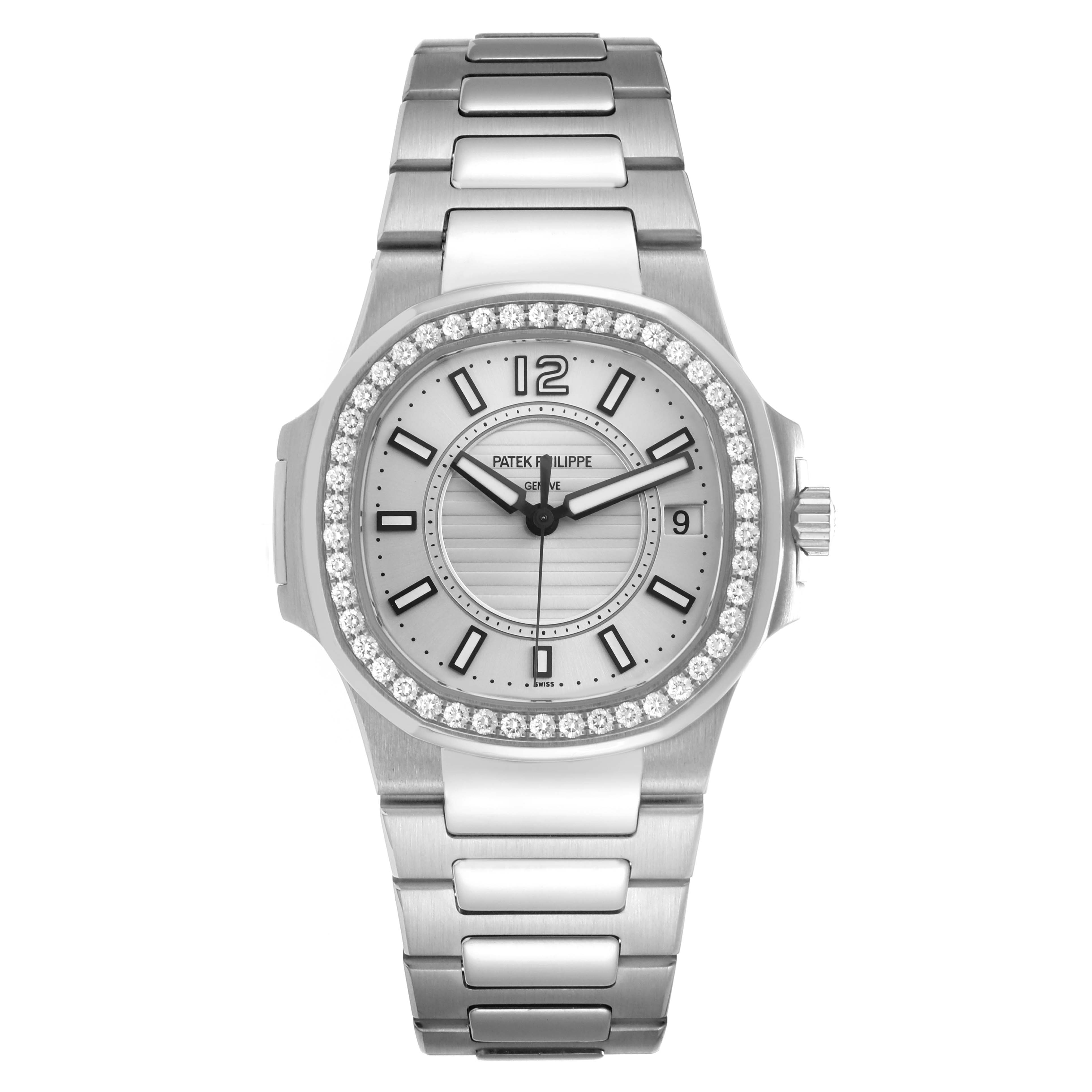 The Patek Philippe Nautilus 7010 Women
s White Gold Silver Dial watch is shown from the front, displaying its dial, bezel, and bracelet.