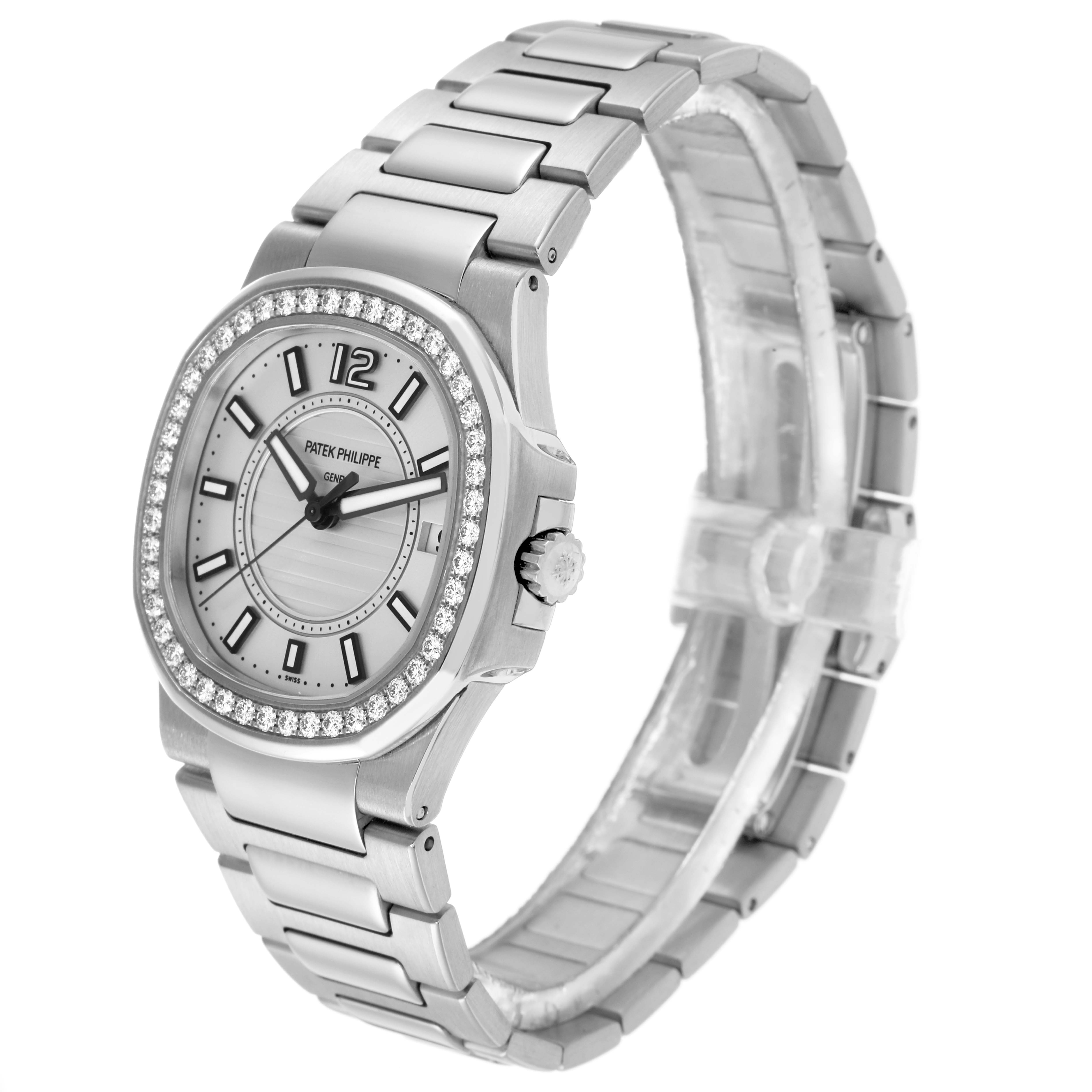 The Patek Philippe Nautilus 7010 Women
s White Gold Silver Dial watch is shown at a three-quarter angle, highlighting the face, bezel, crown, and bracelet.