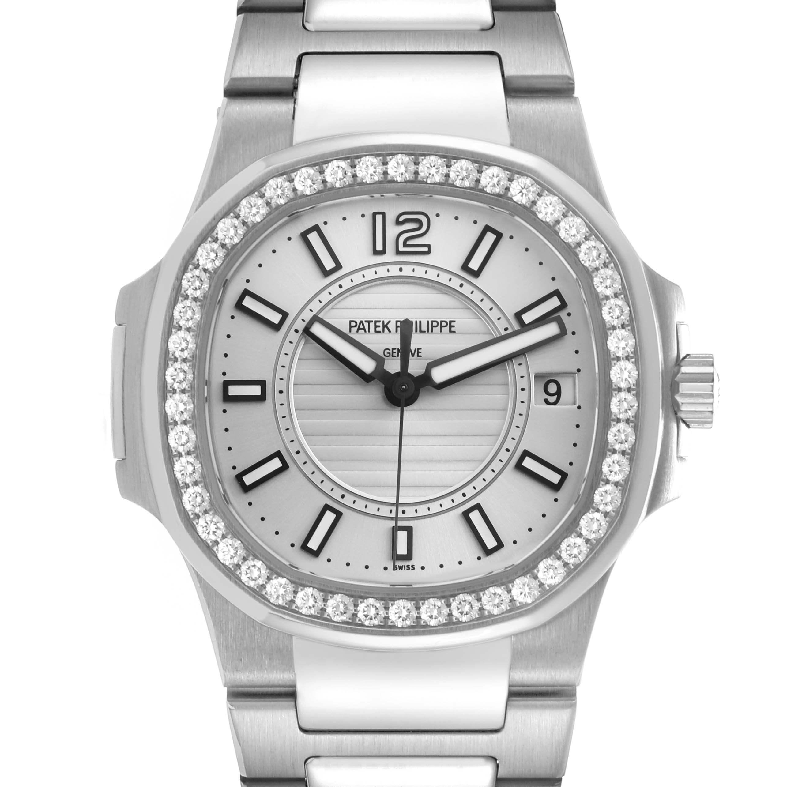 The image shows a front view of a Patek Philippe Nautilus 7010 Women
s White Gold Silver Dial watch, highlighting the dial, bezel with diamonds, and part of the bracelet.