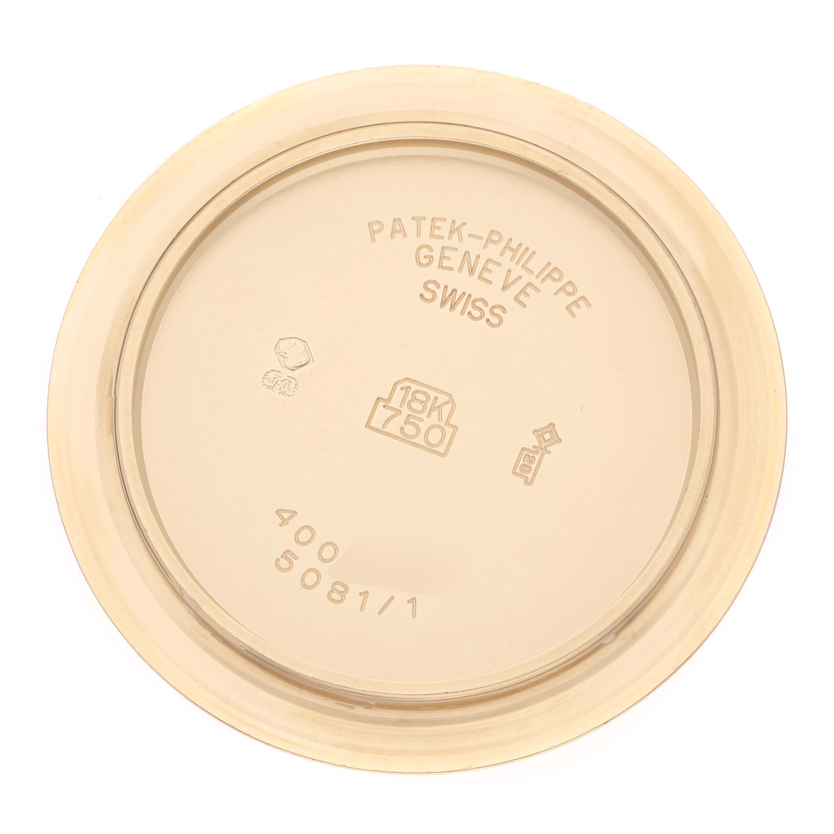 This image shows the back case cover of a Patek Philippe Neptune 5081/1J-001 Men's Yellow Gold Silver Dial 5081/1J-001 Men's Yellow Gold Silver Dial model watch, highlighting the brand, material, and markings.