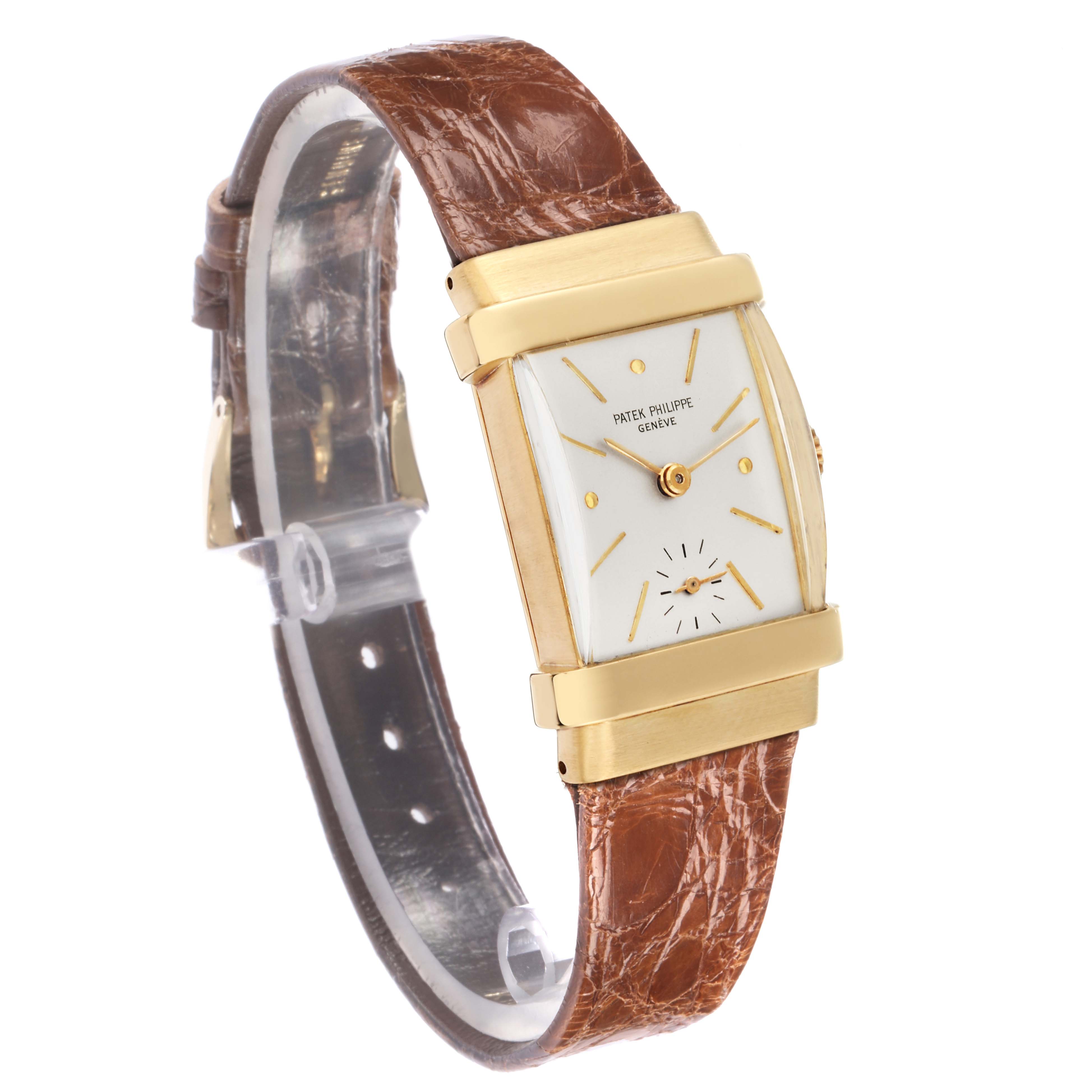 The Patek Philippe Vintage 1450 Men
s Yellow Gold Silver Dial model is shown at a slight angle, highlighting its rectangular gold case, white dial, and brown leather strap.