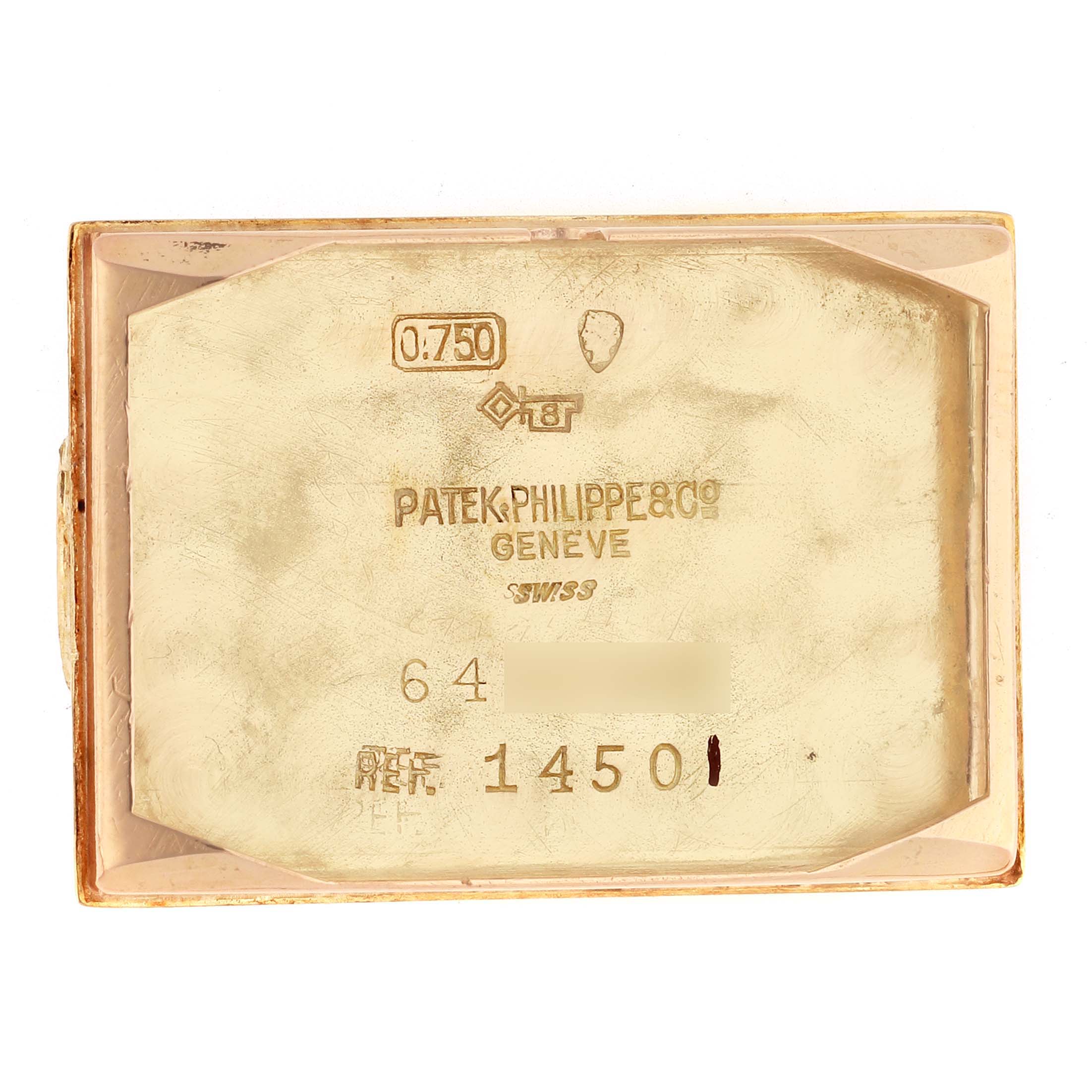 The image shows the inner case back of a Vintage Patek Philippe watch, highlighting the engravings and markings.