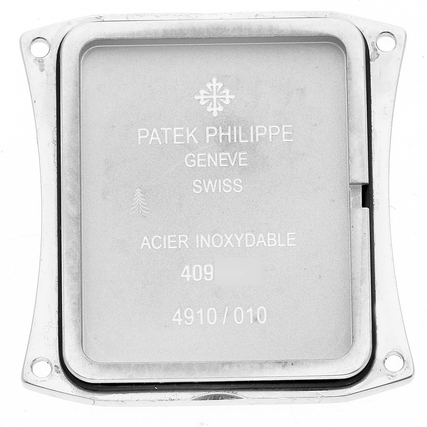 The image shows the back cover of a Patek Philippe Twenty-4 4910 Women's Stainless Steel Grey Dial 4910 Women's Stainless Steel Grey Dial model watch, displaying its inscriptions and details.