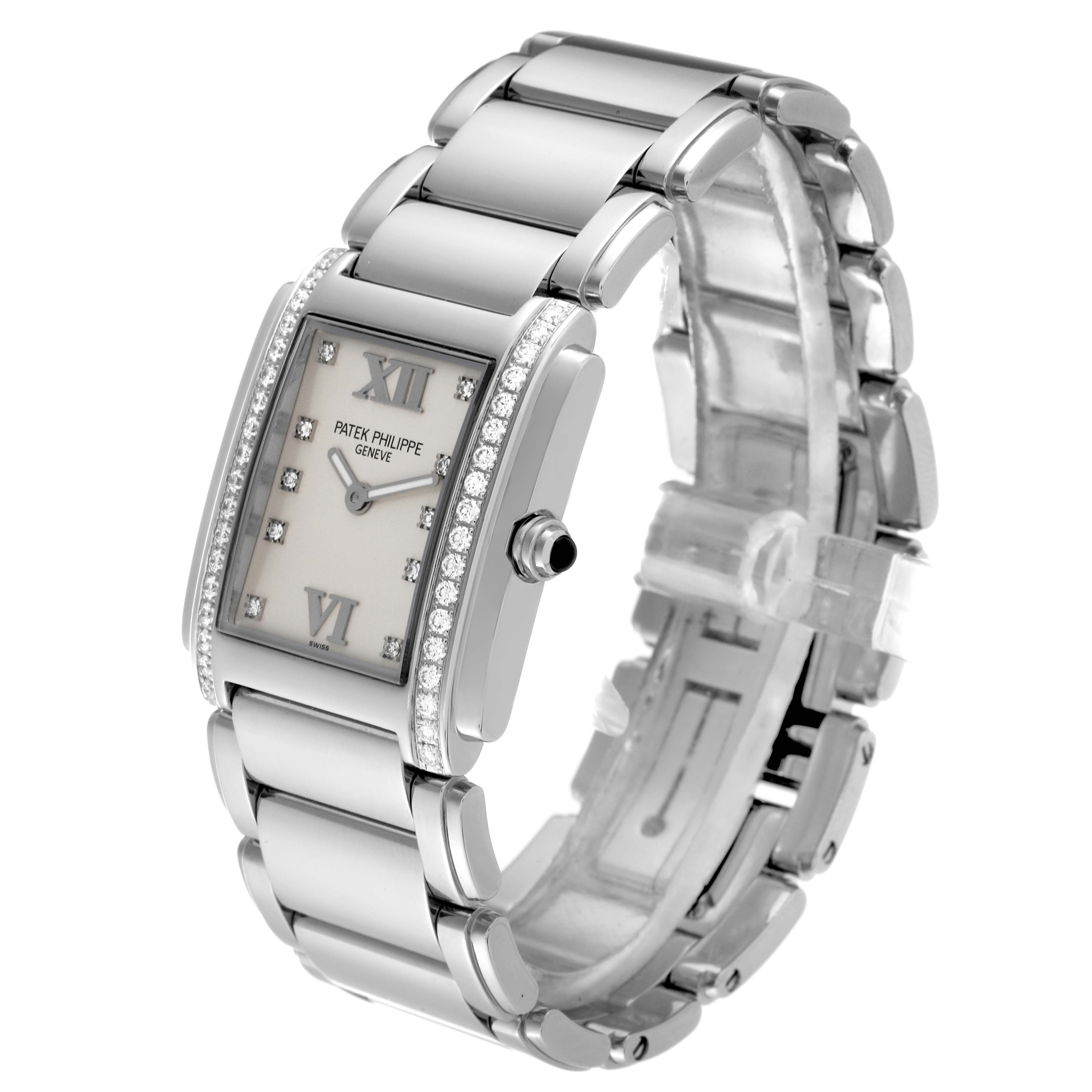 The image shows a Patek Philippe Twenty-4 4910/10A-011 Women's Stainless Steel Silver Dial 4910/10A-011 Women's Stainless Steel Silver Dial watch at a slight angle, featuring its face, bezel, and silver bracelet.