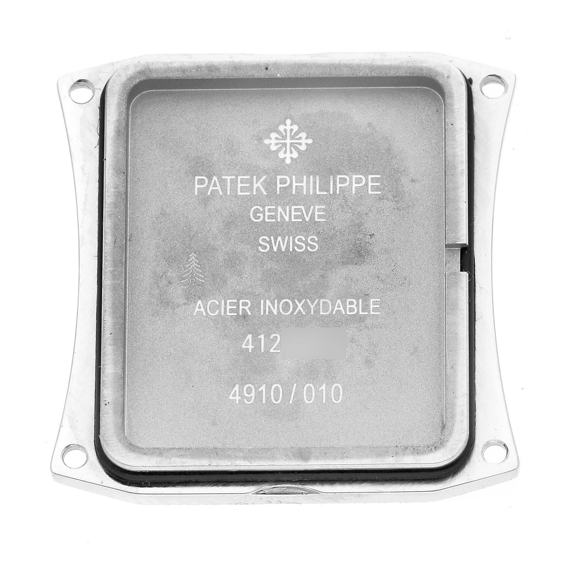 The image shows the back cover of a Patek Philippe Twenty-4 4910/10A-011 Women's Stainless Steel Silver Dial 4910/10A-011 Women's Stainless Steel Silver Dial watch, displaying brand engravings and model details.