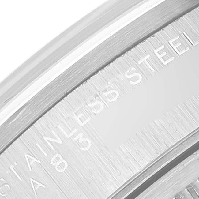 This close-up image shows the "STAINLESS STEEL" engraving on the Rolex Air-King 14000 Men's Stainless Steel Blue Dial 14000 Men's Stainless Steel Blue Dial watch.
