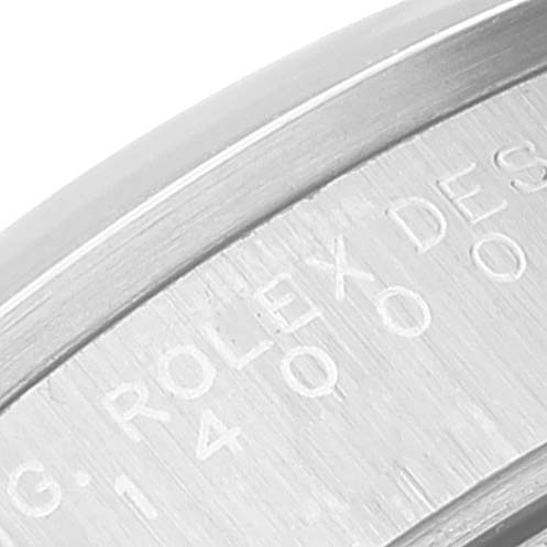 The image shows a close-up of the inner bezel of a Rolex Air-King 14000 Men's Stainless Steel Blue Dial 14000 Men's Stainless Steel Blue Dial watch, with "Rolex" and a serial number engraved.