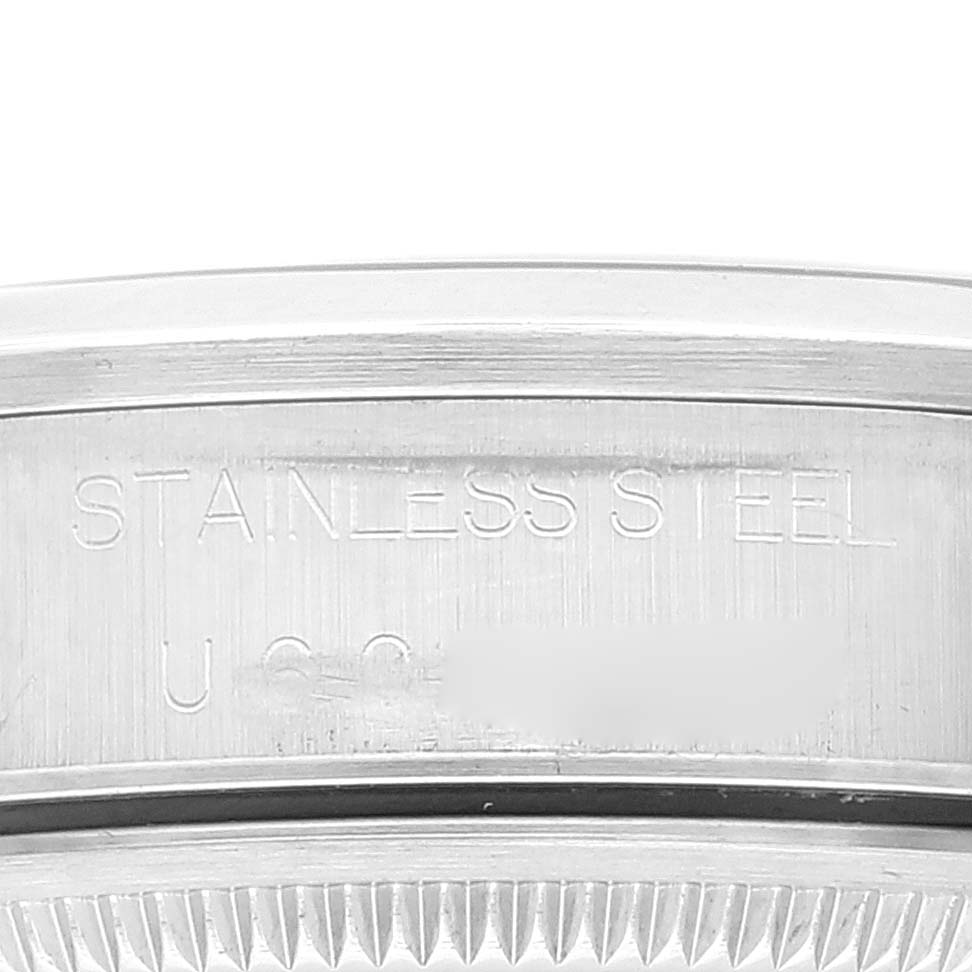 This image shows a close-up of the stainless steel case back edge of a Rolex Air-King 14000 Men's Stainless Steel Blue Dial 14000 Men's Stainless Steel Blue Dial watch.