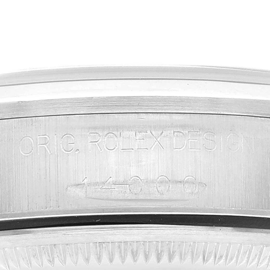 The image shows a close-up of the side of the bezel and case of a Rolex Air-King 14000 Men's Stainless Steel Blue Dial 14000 Men's Stainless Steel Blue Dial watch, highlighting the model number engraving.